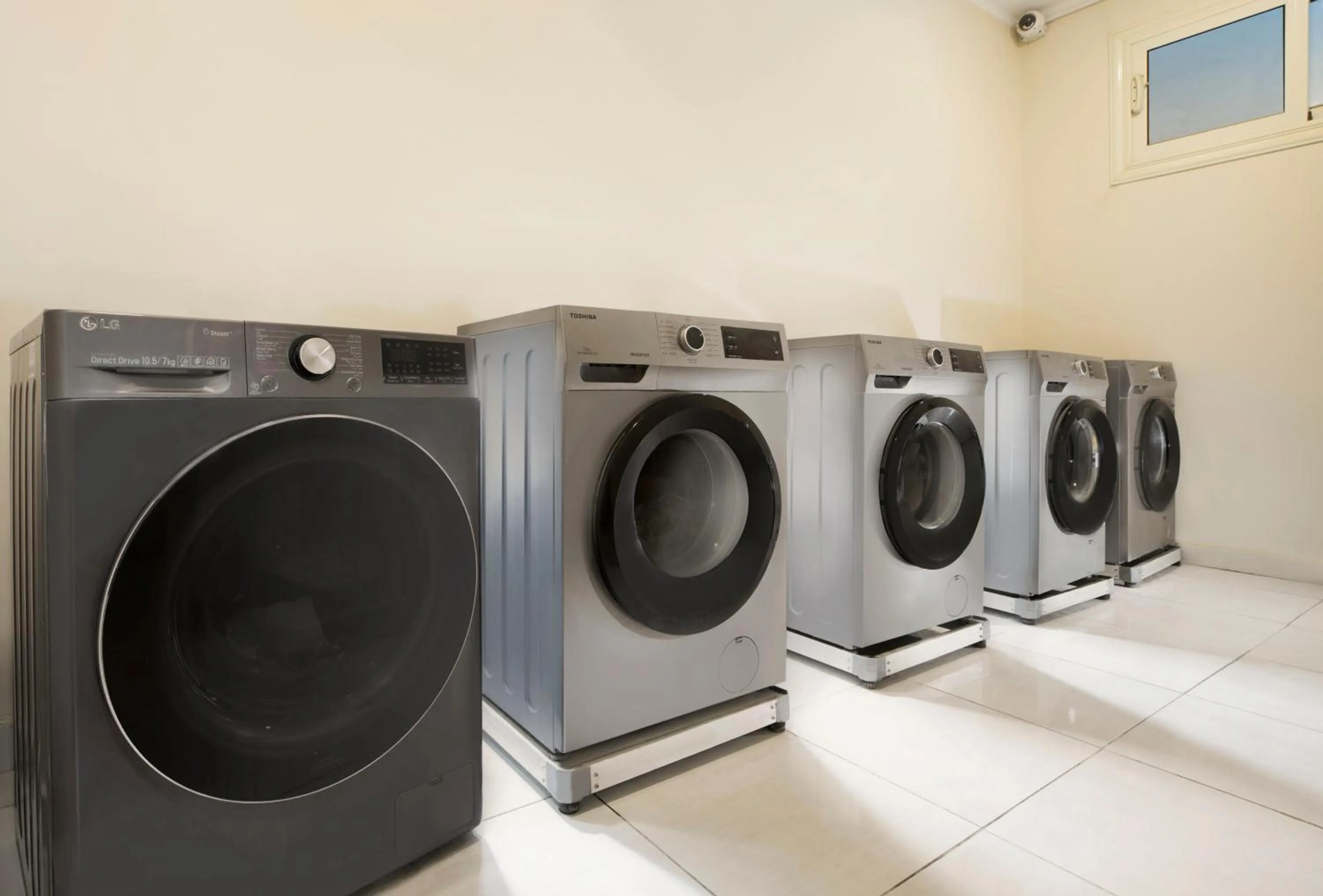 washing machine in Vibotel Residence Hotel Apartments