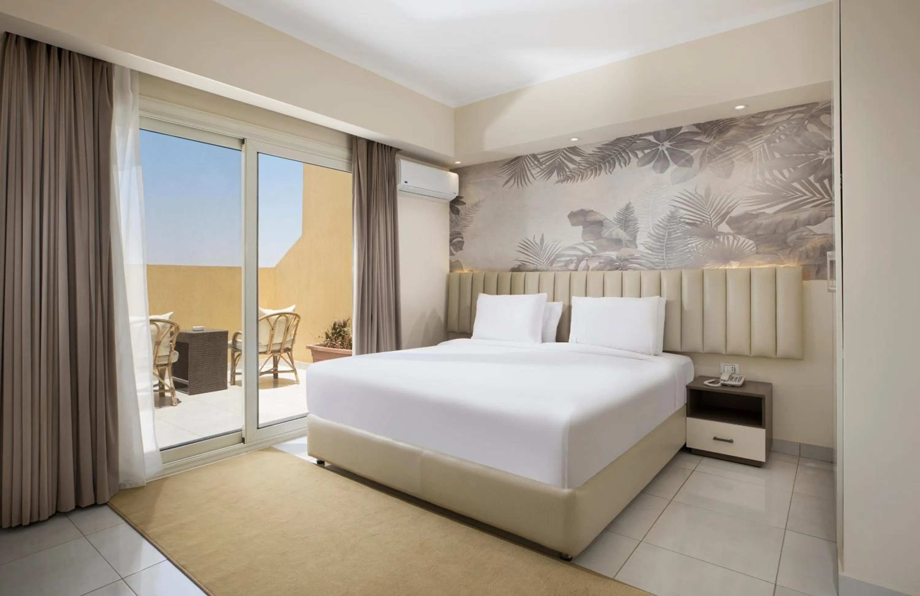 Bed in Vibotel Residence Hotel Apartments