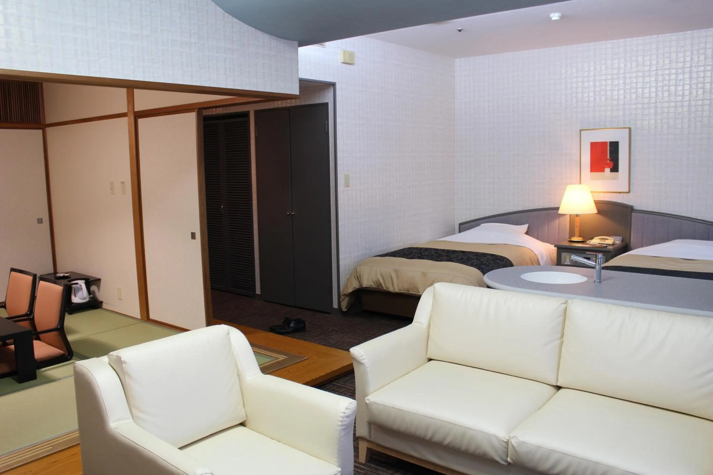 Bed in The Gran Resort Princess Arima