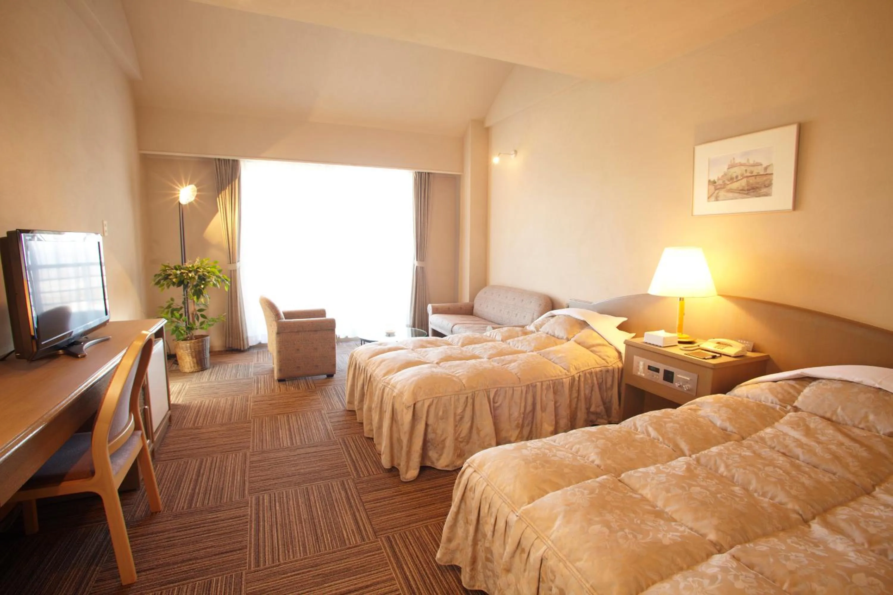 Bed in The Gran Resort Princess Arima