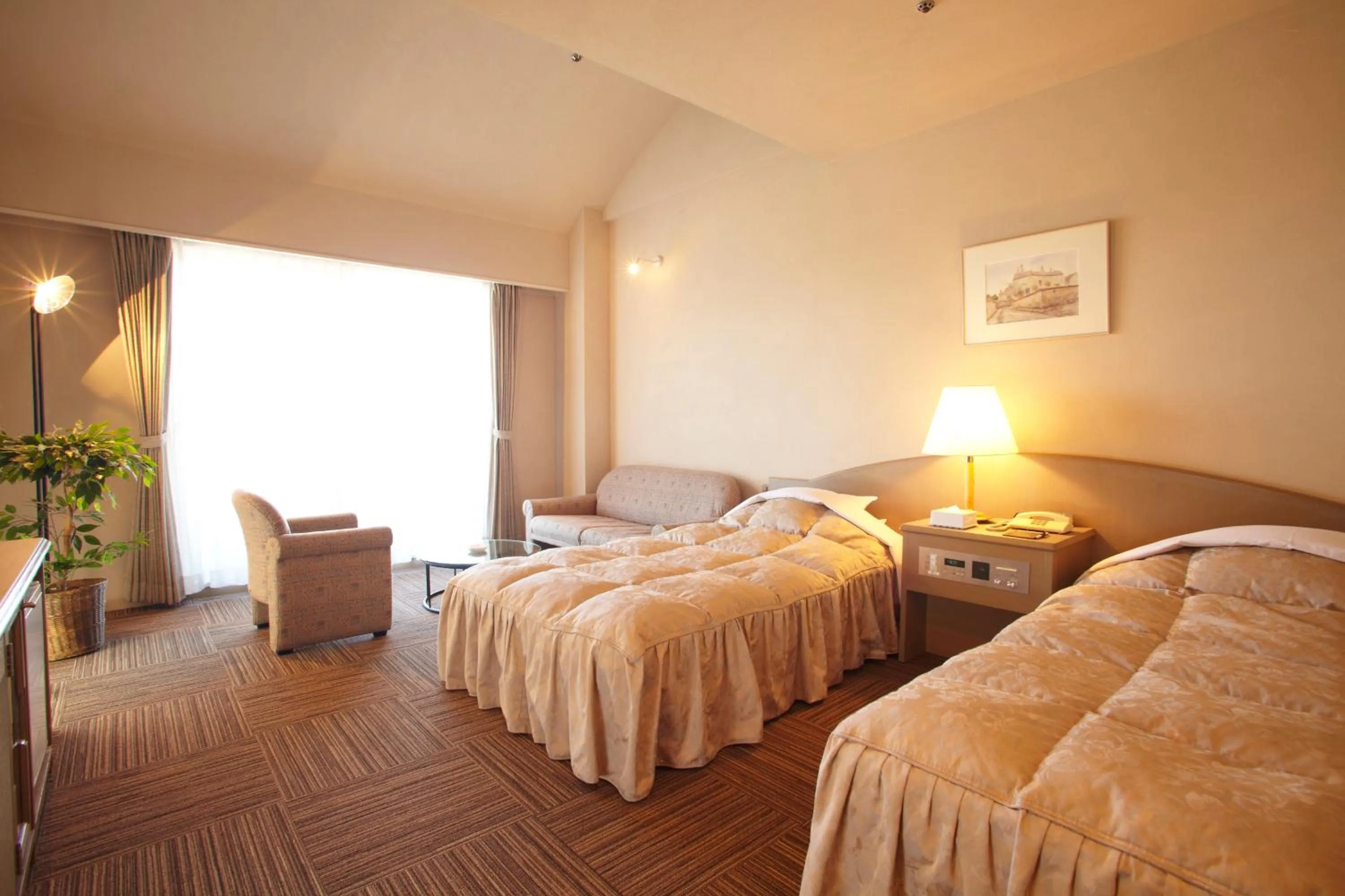 Bed in The Gran Resort Princess Arima