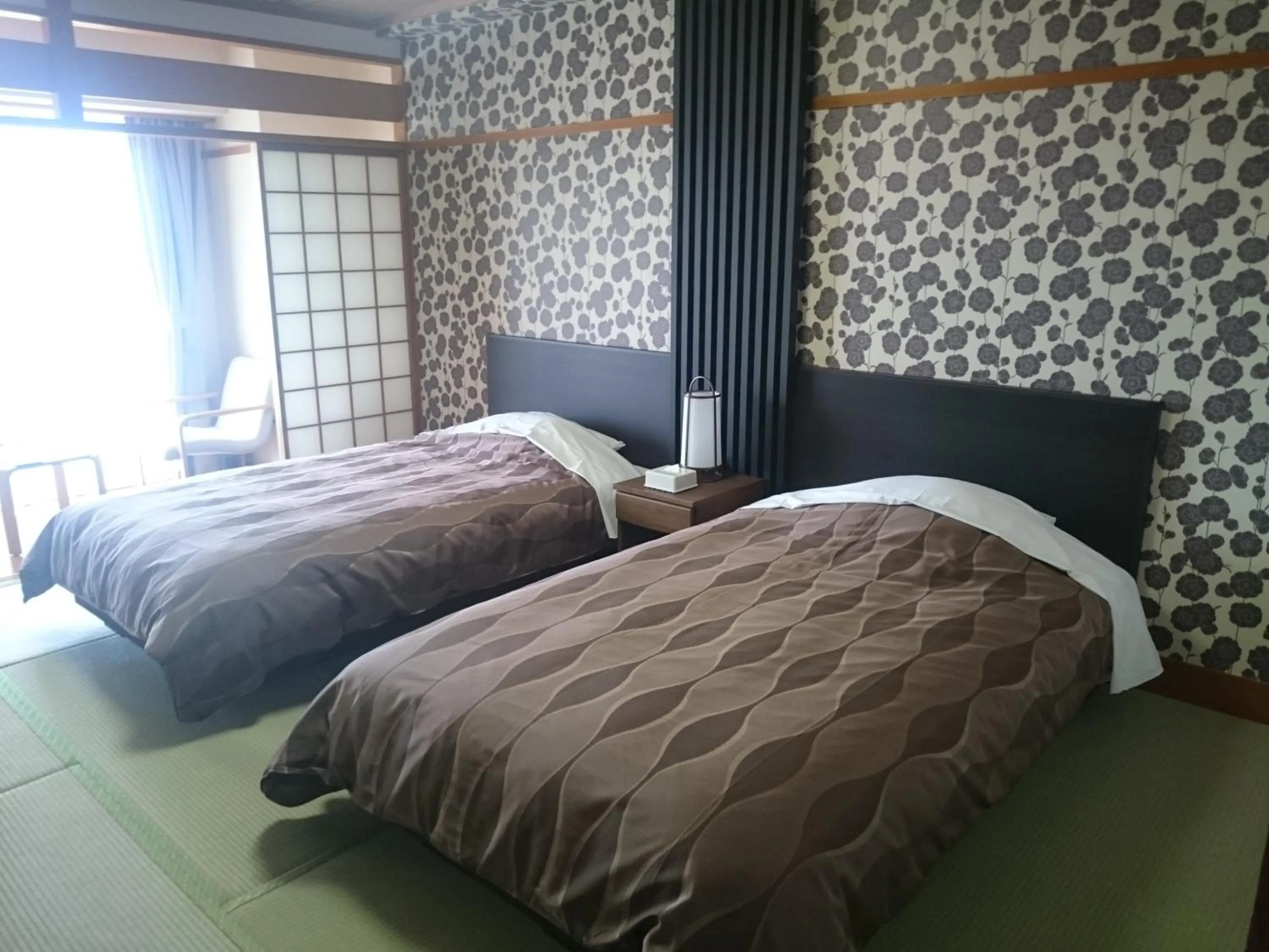 Bed in The Gran Resort Princess Arima