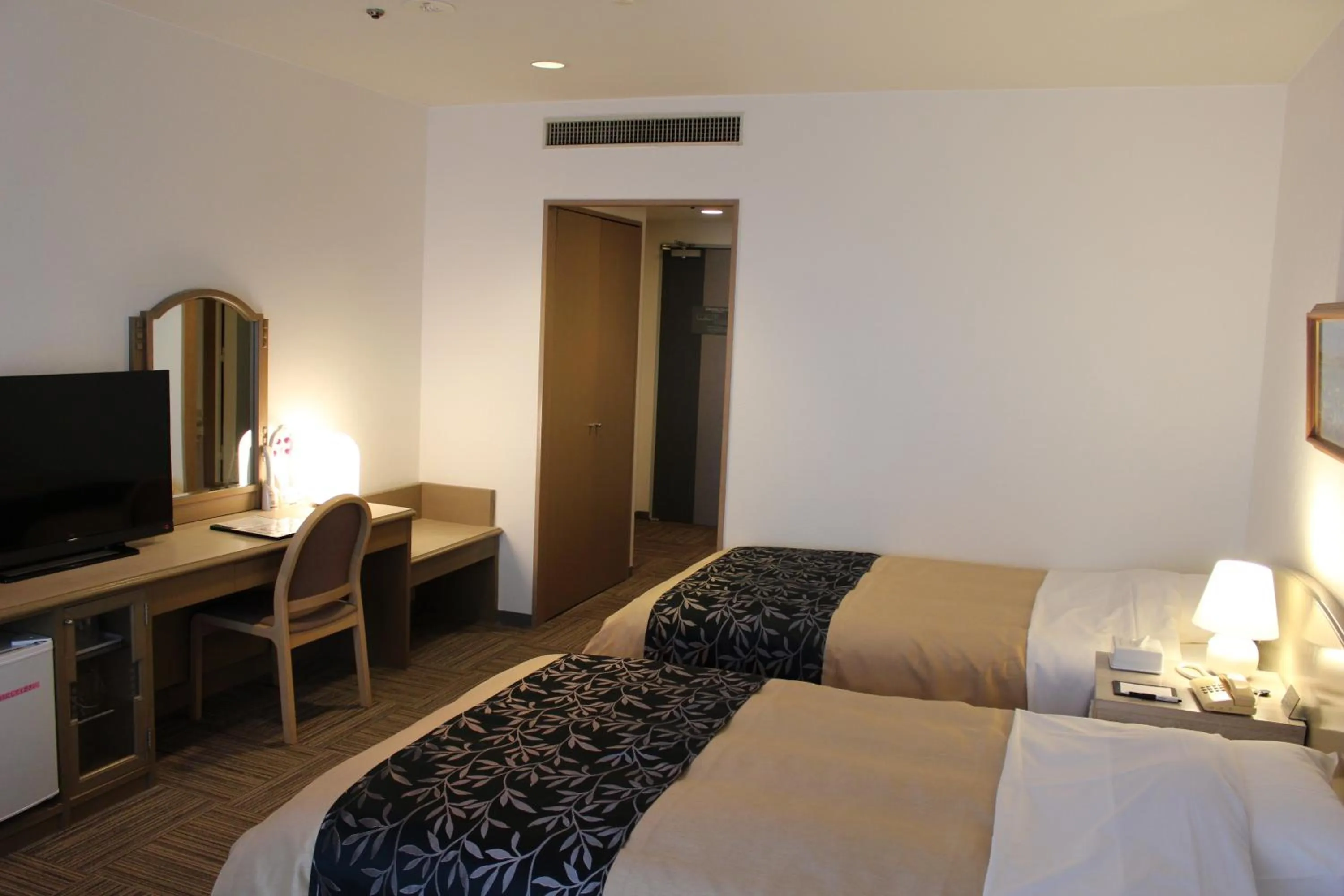 Bed in The Gran Resort Princess Arima