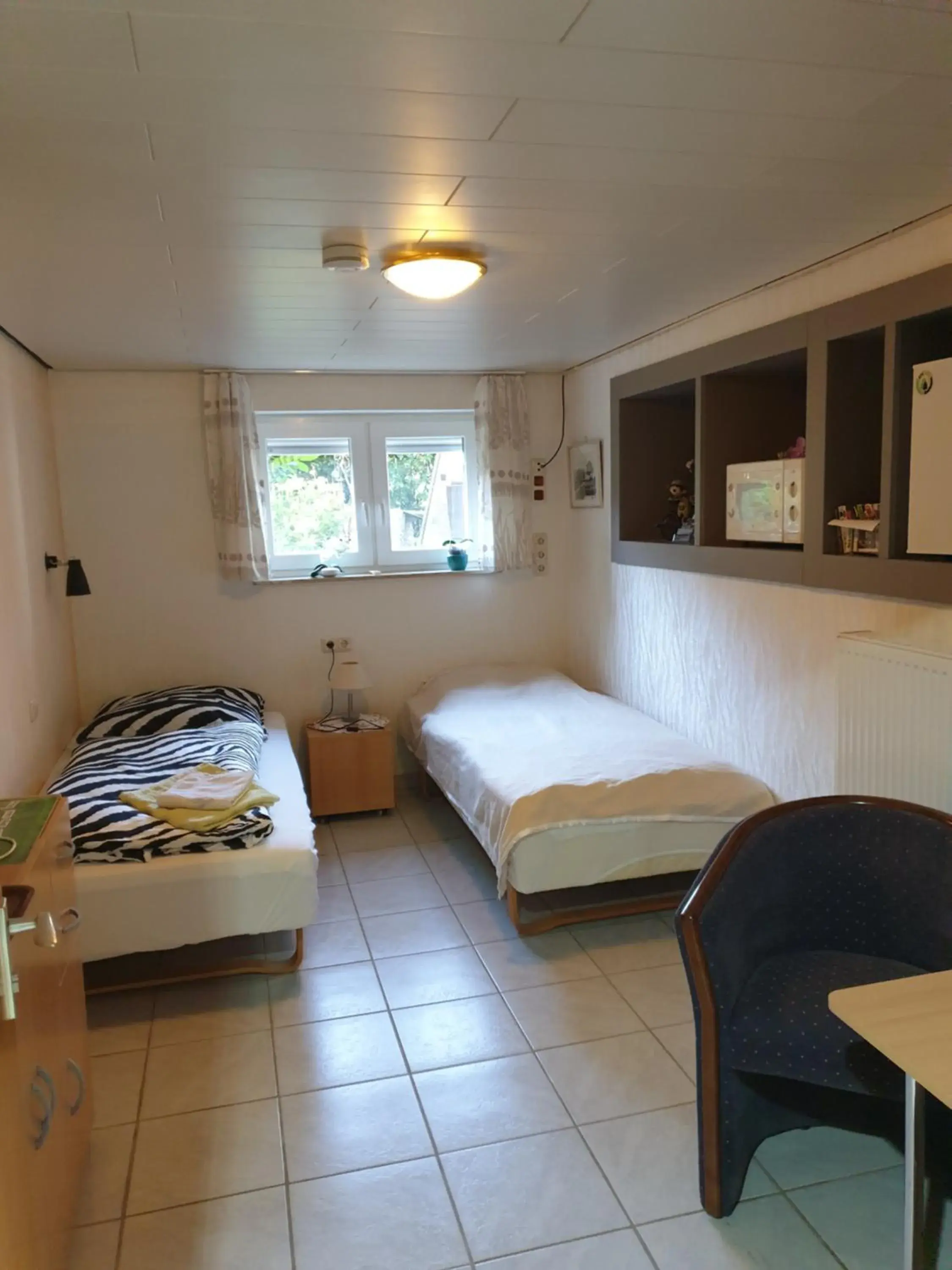 Twin Room with Shared Bathroom - single occupancy in B & B Buchhorst 21481 Twin Room with Shared Bathroom - single occupancy in B & B Buchhorst 21481