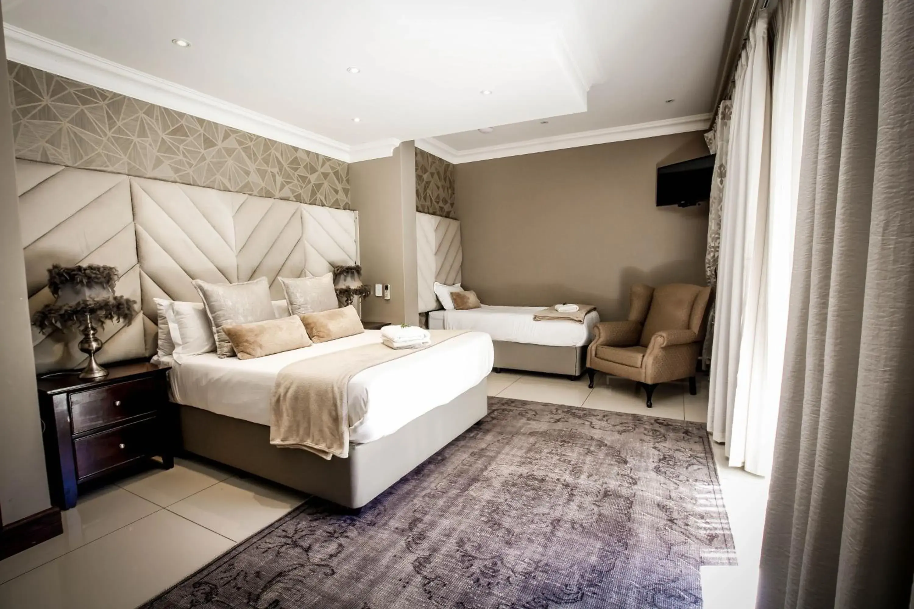 Deluxe Triple Room in Potch Manor Guest House Deluxe Triple Room in Potch Manor Guest House