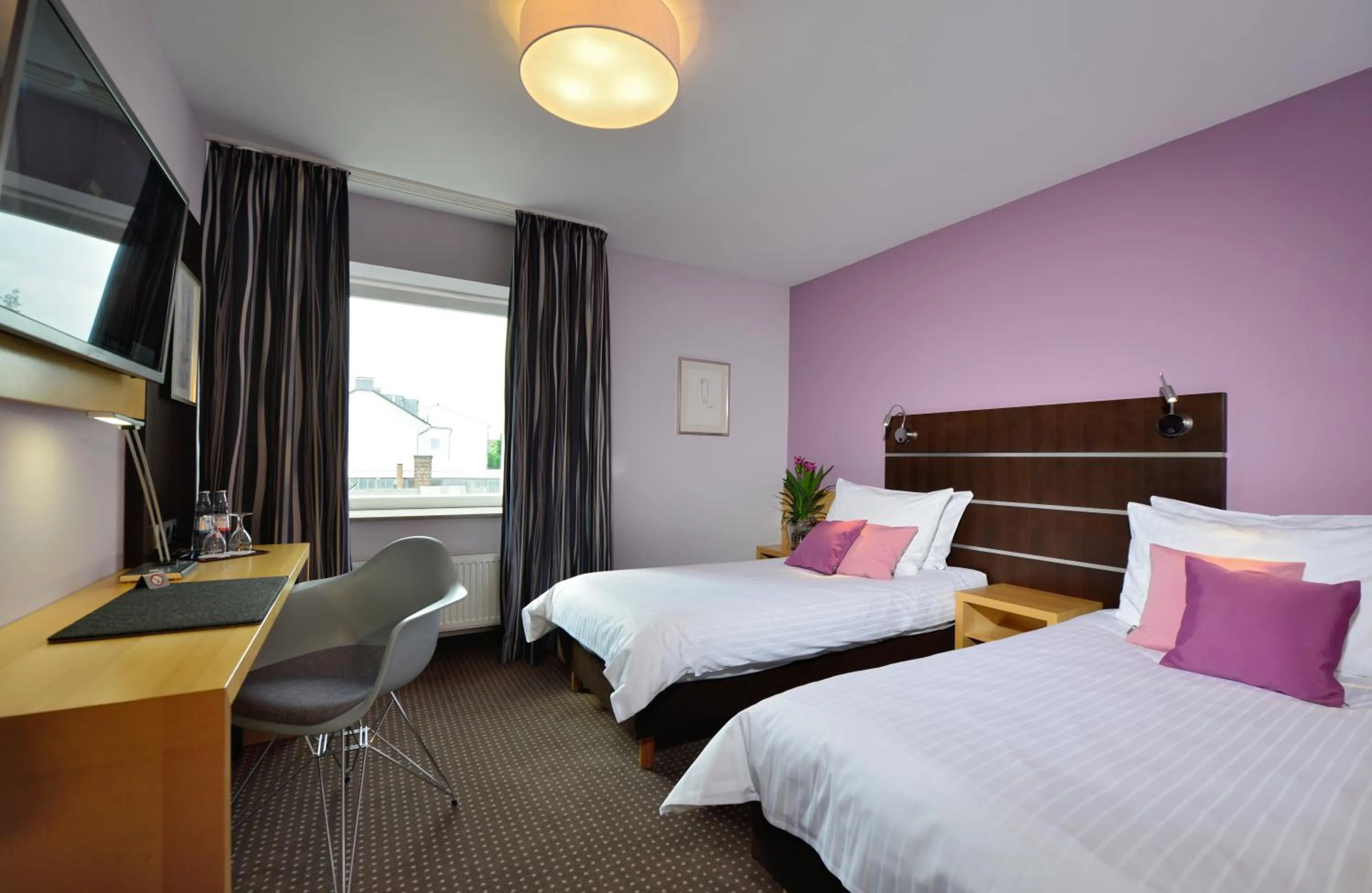 Photo of the whole room, Bed in Hotel Uhu Garni - Superior