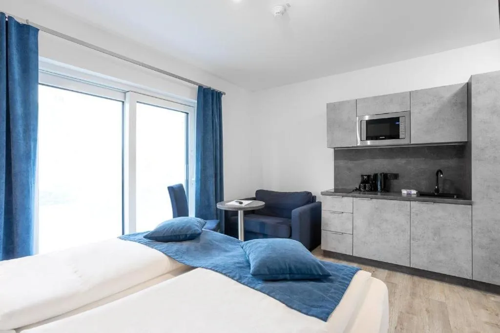 Bed in Familien- und Aparthotel Strandhof