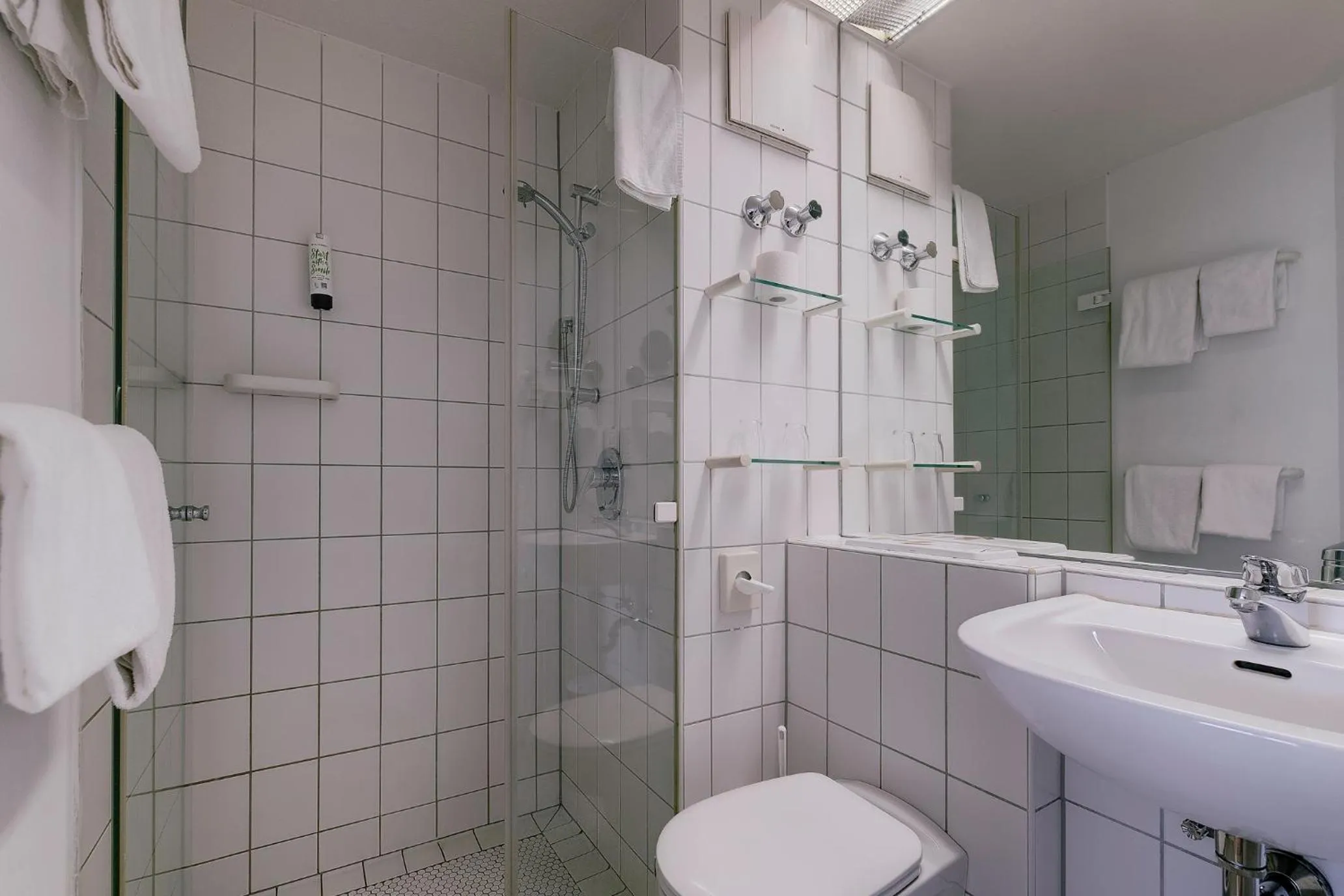 Bathroom in Ambiente Langenhagen Hannover by Tulip Inn