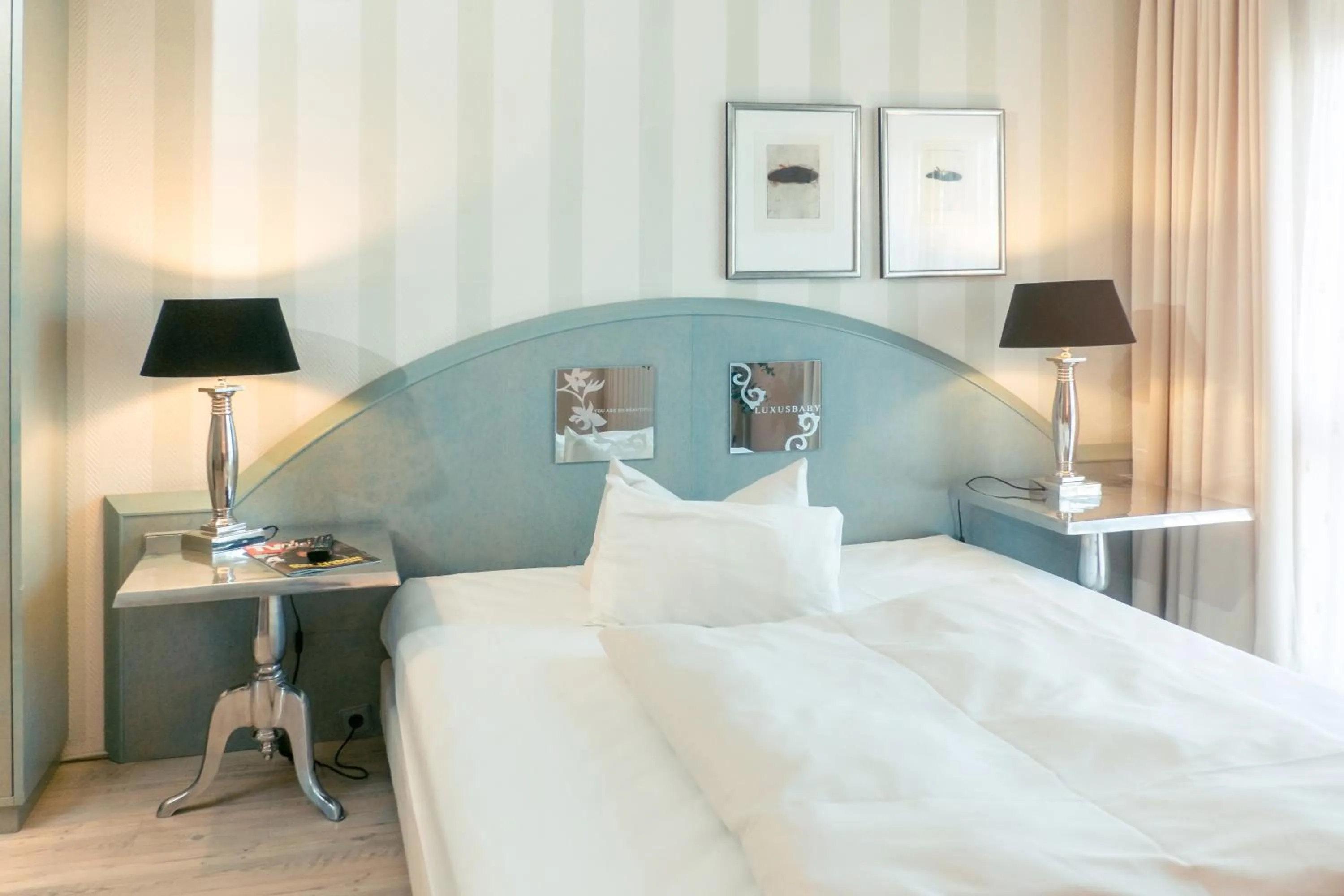 Photo of the whole room, Bed in Ambiente Langenhagen Hannover by Tulip Inn