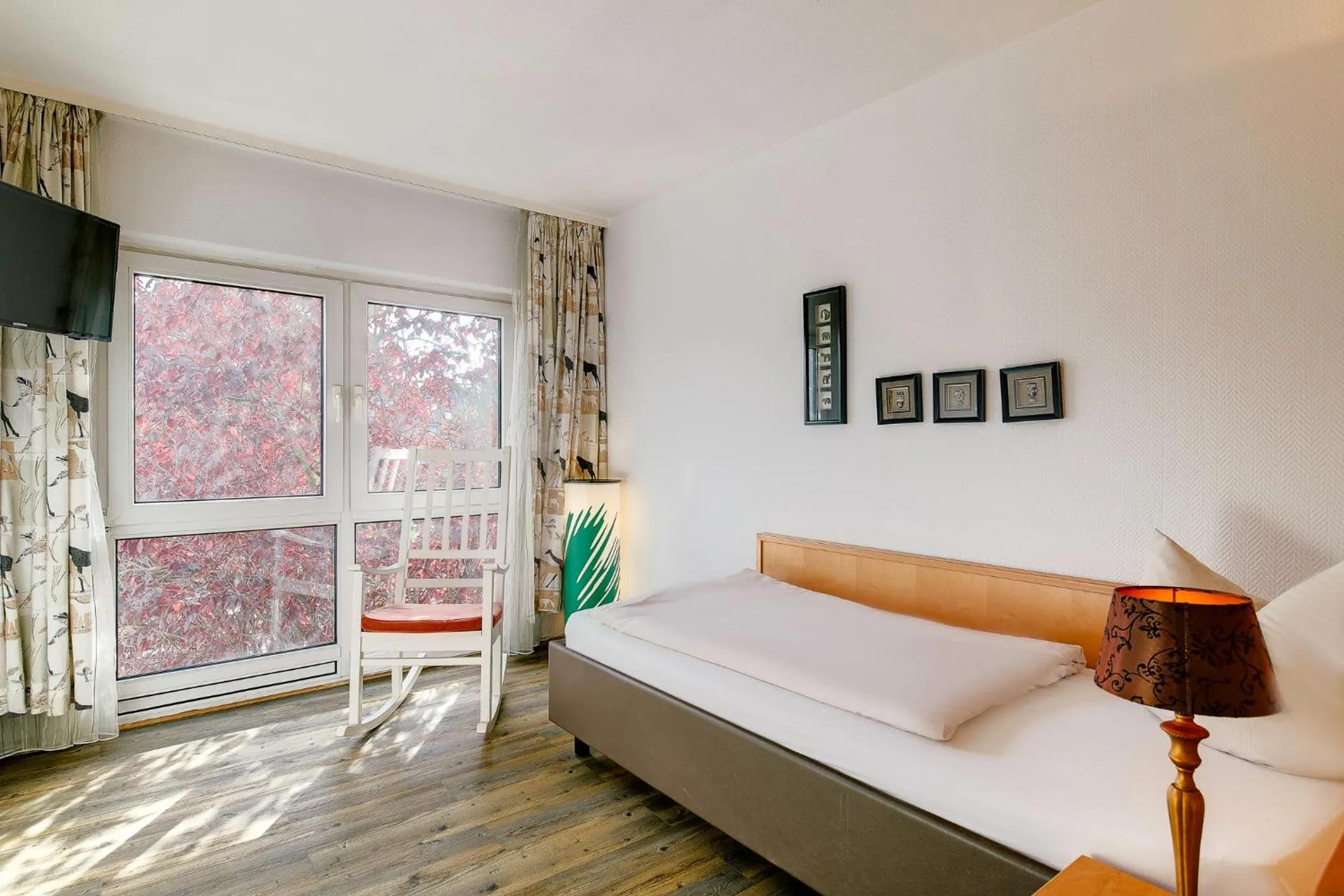 Photo of the whole room, Bed in Ambiente Langenhagen Hannover by Tulip Inn