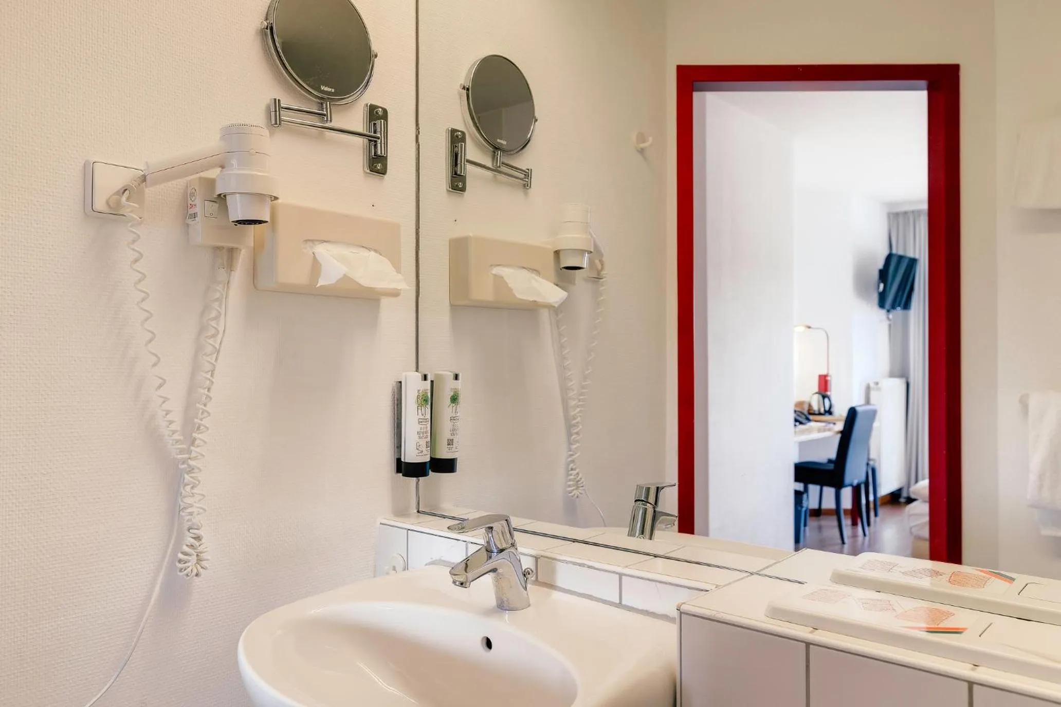 Bathroom in Ambiente Langenhagen Hannover by Tulip Inn