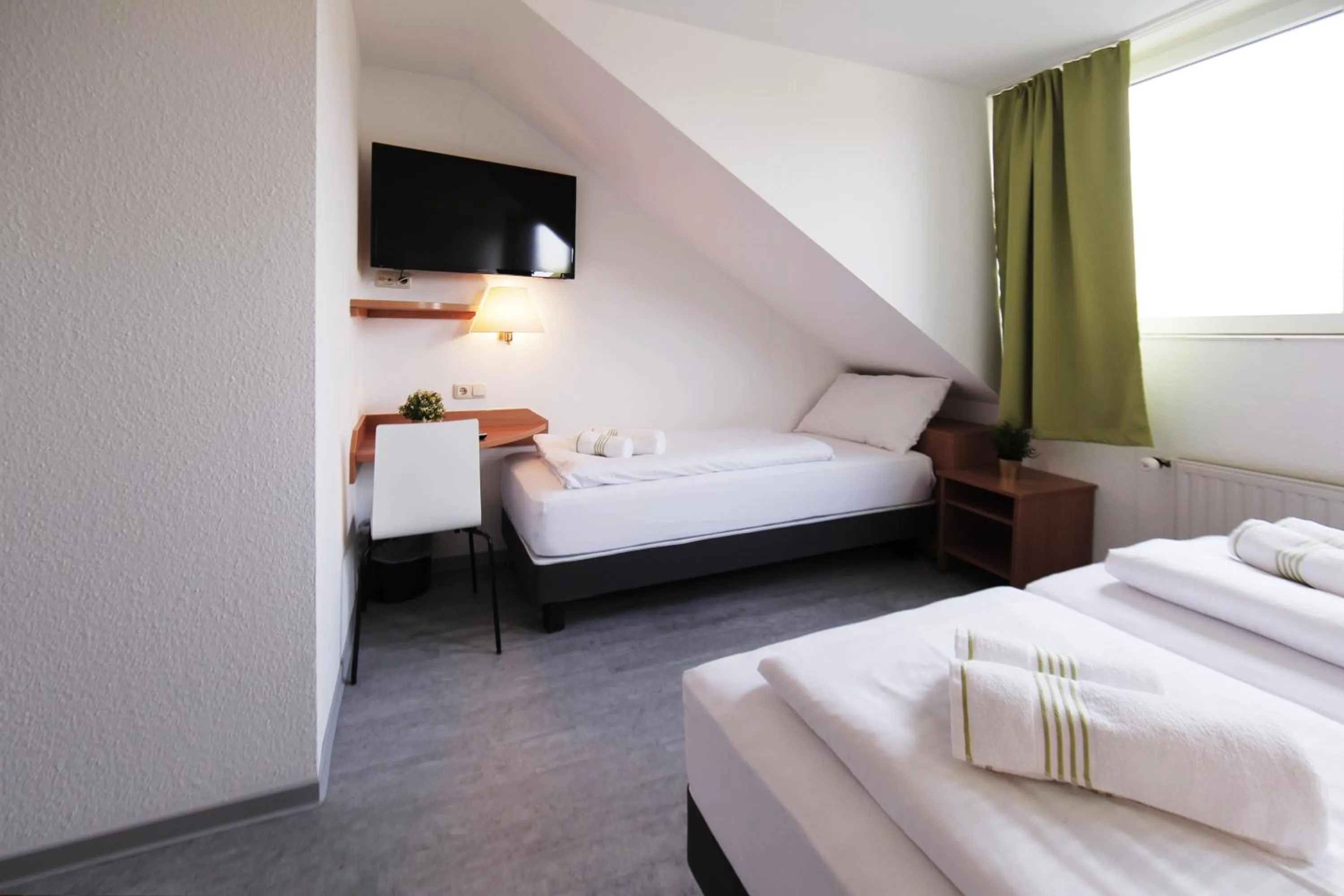 Photo of the whole room, Bed in bp24 Hotel Aachen