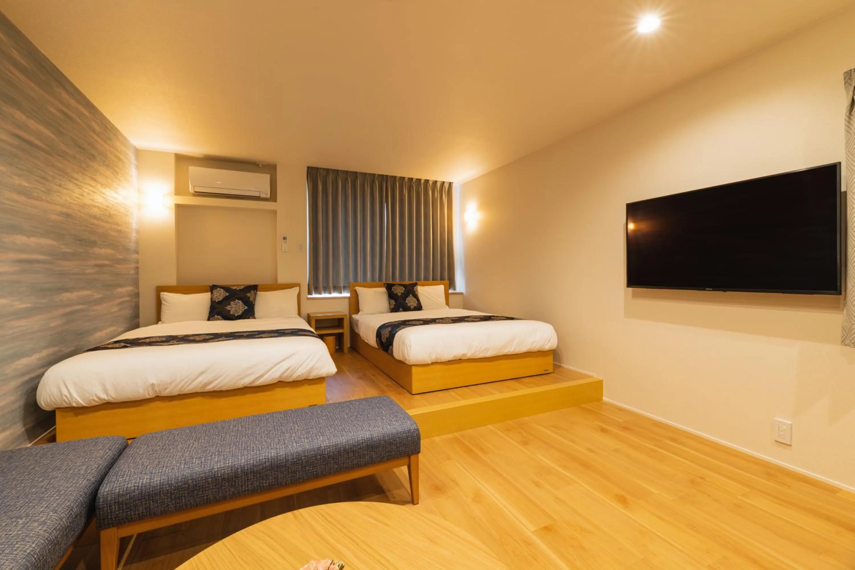 Photo of the whole room, Bed in GRAND BASE Nagasaki City