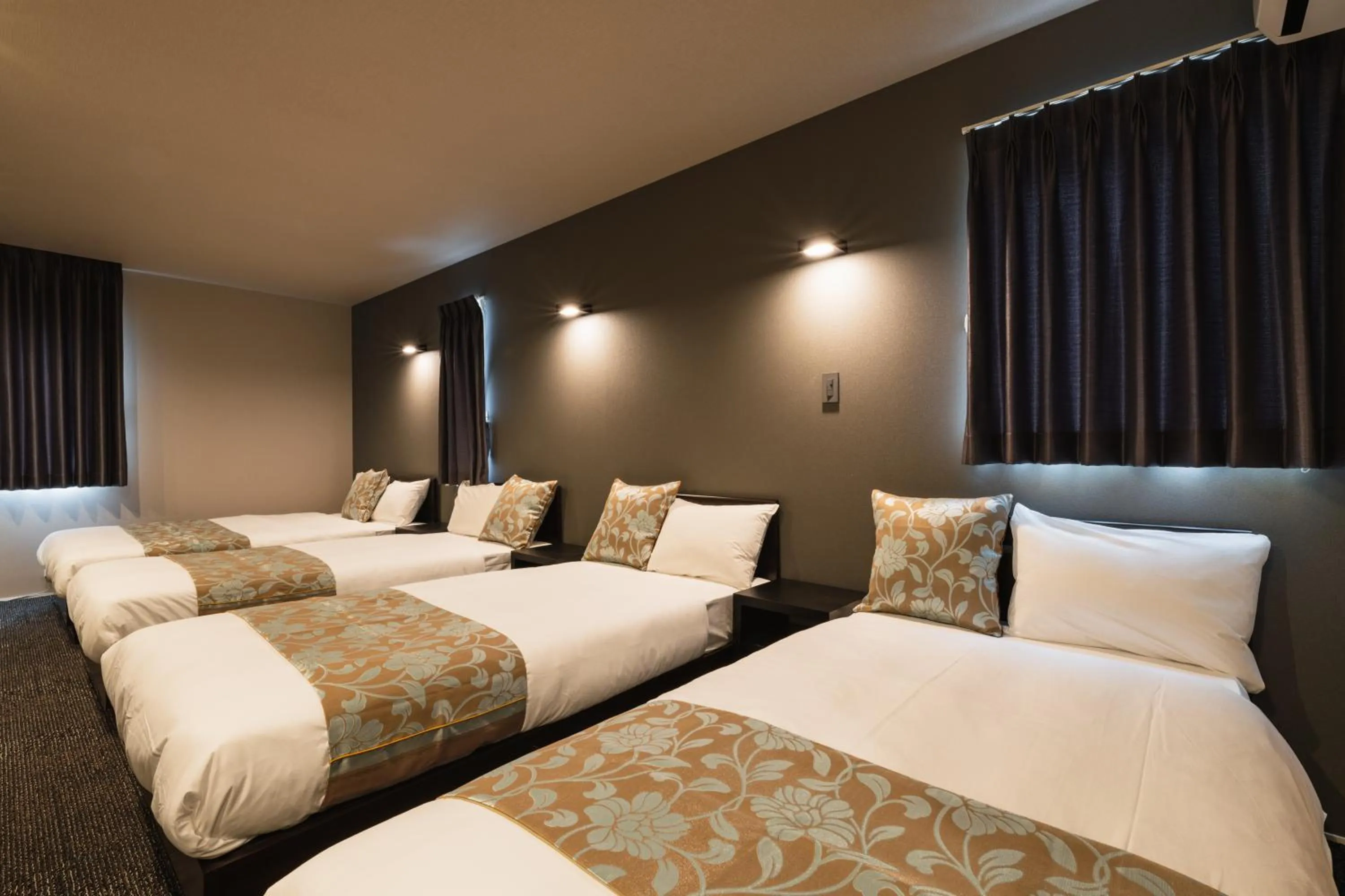 Bed in GRAND BASE Nagasaki City