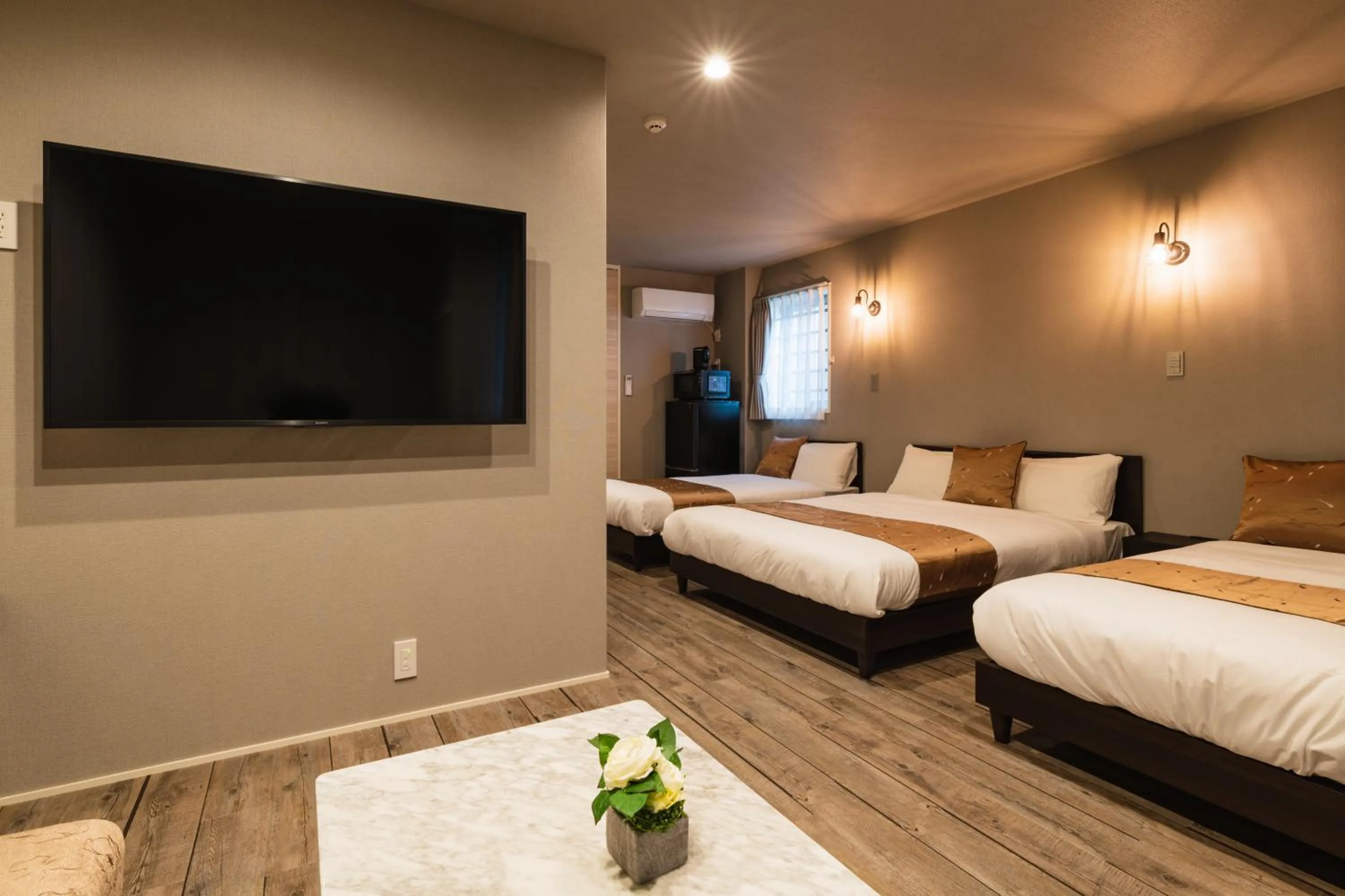 Photo of the whole room, Bed in GRAND BASE Nagasaki City