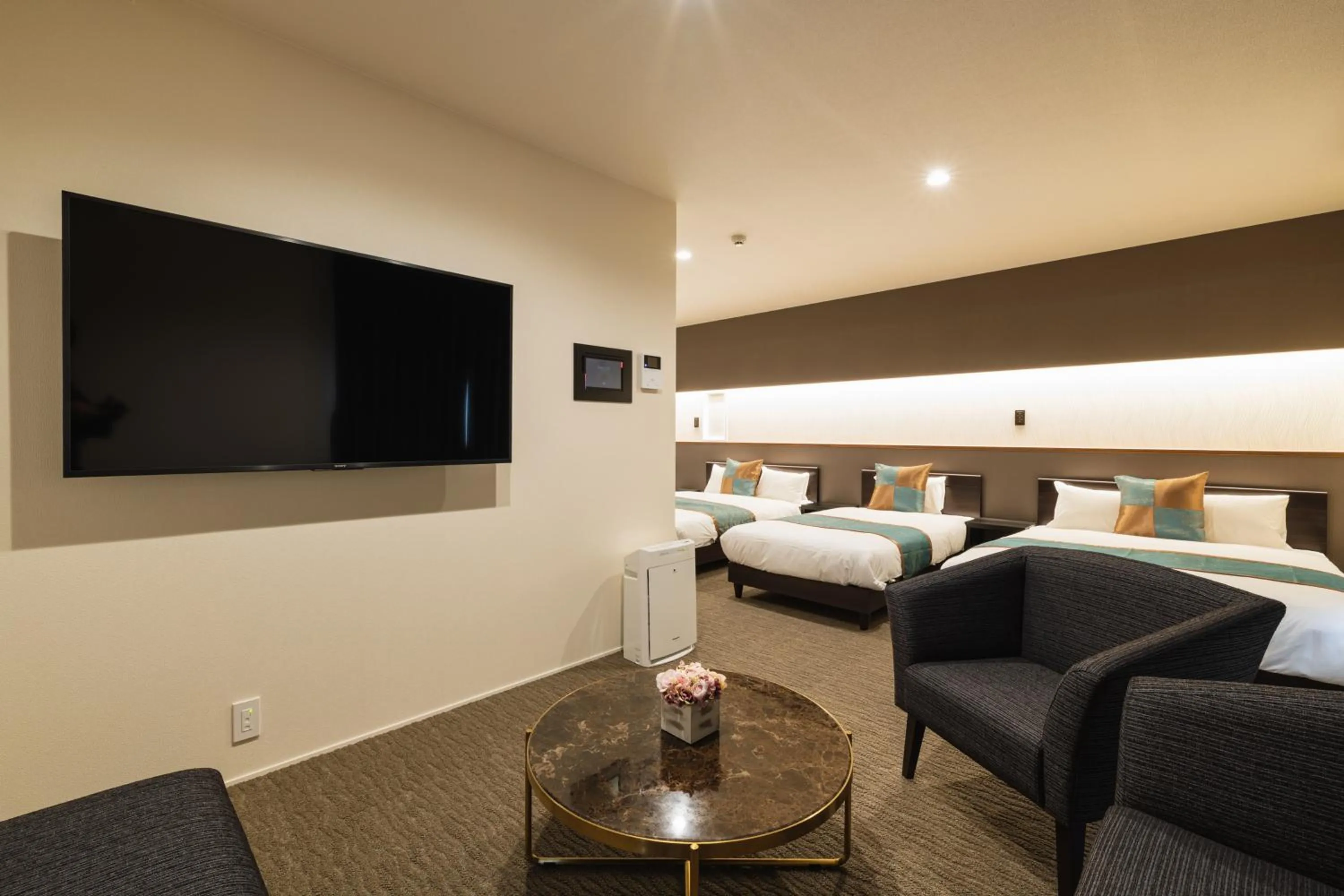 Photo of the whole room, Bed in GRAND BASE Nagasaki City