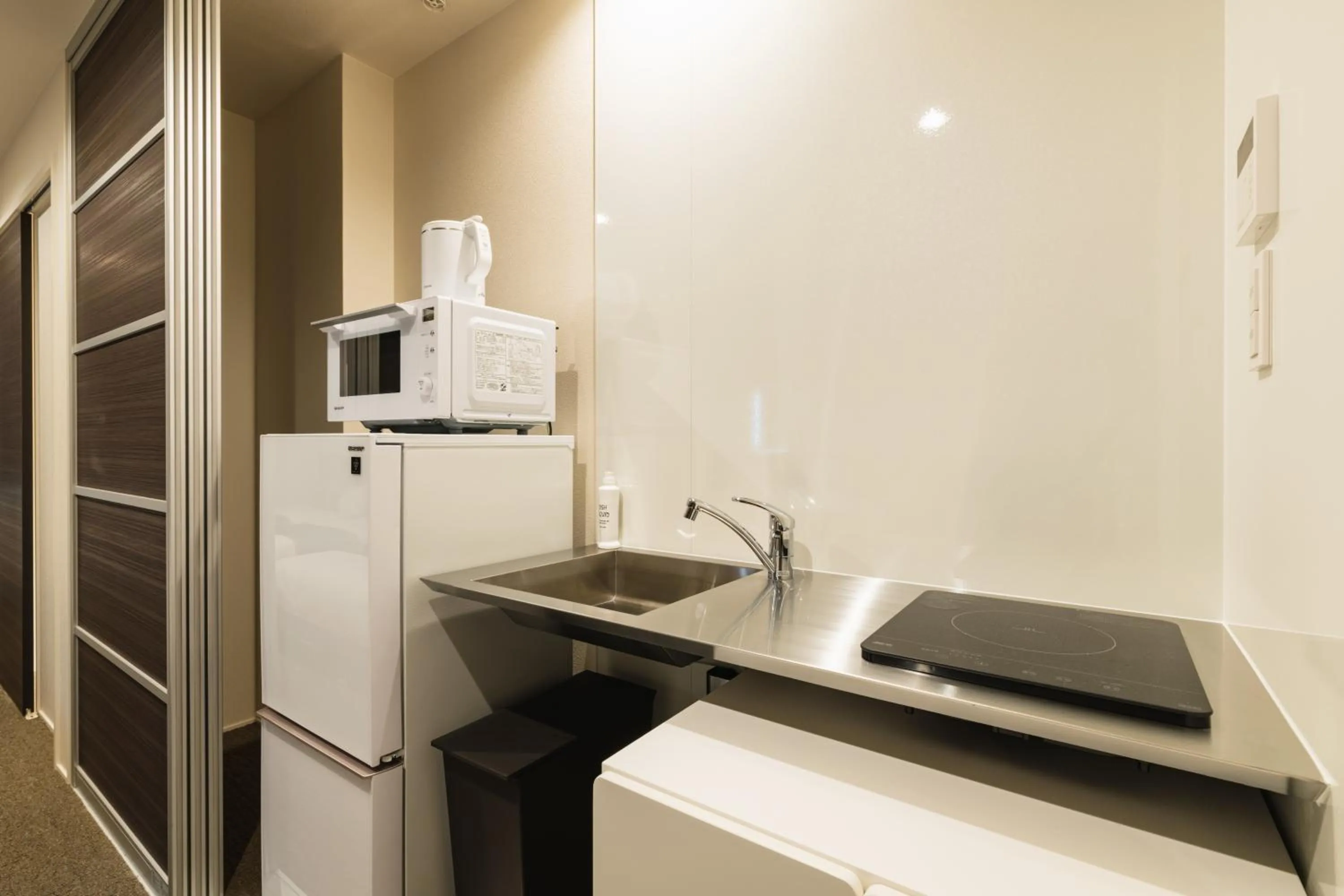 Kitchen or kitchenette in GRAND BASE Nagasaki City