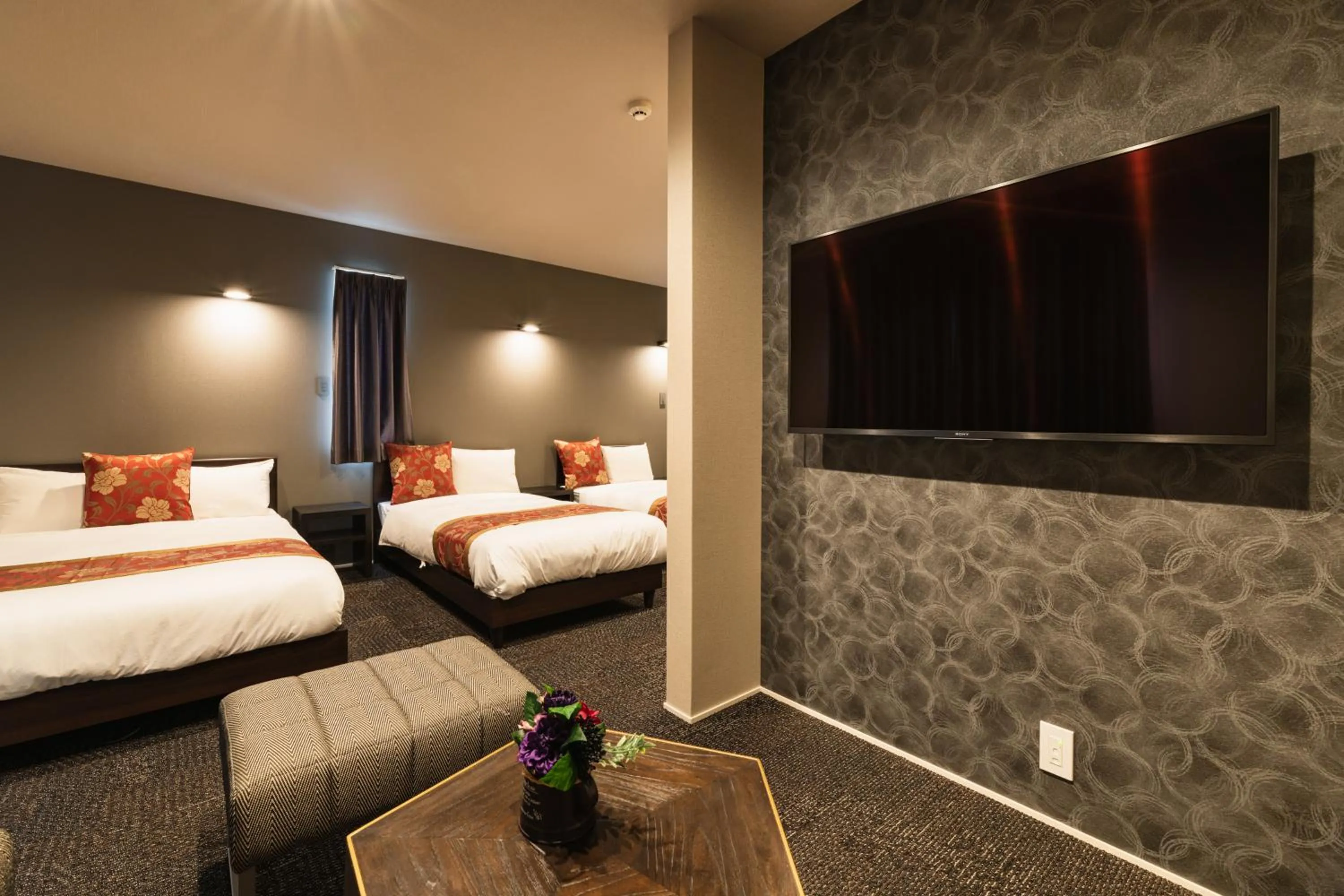 Photo of the whole room, Bed in GRAND BASE Nagasaki City