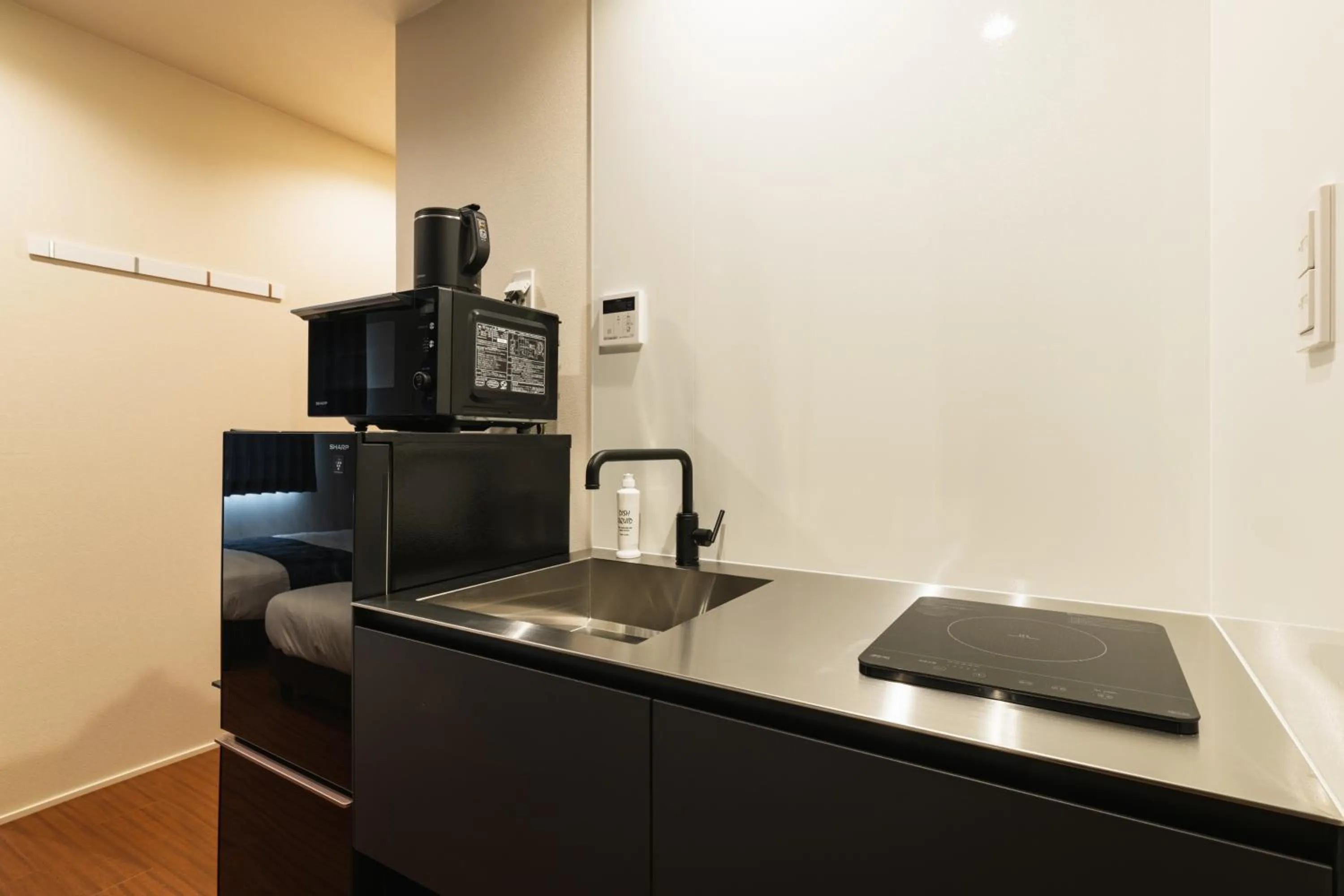 Kitchen or kitchenette in GRAND BASE Nagasaki City