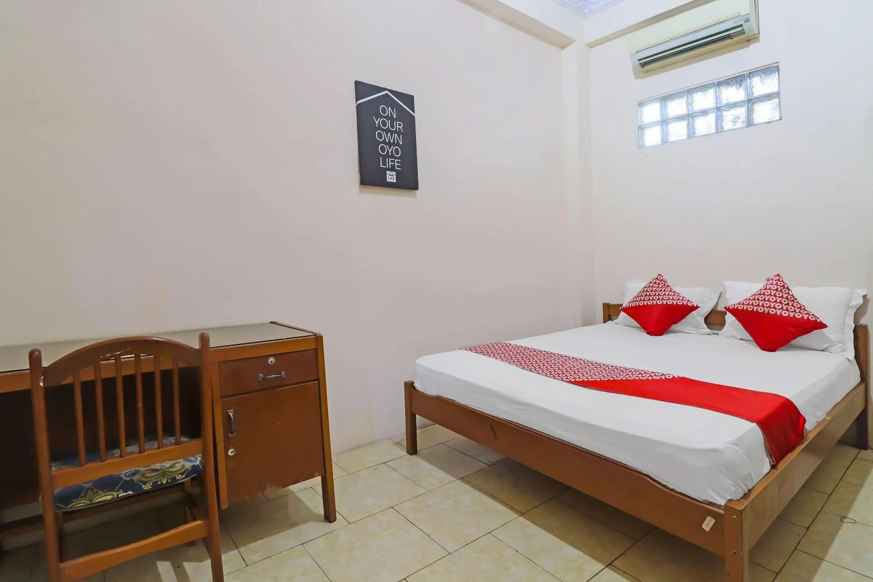 Bedroom in OYO 2899 Ardilia Bandara Syariah