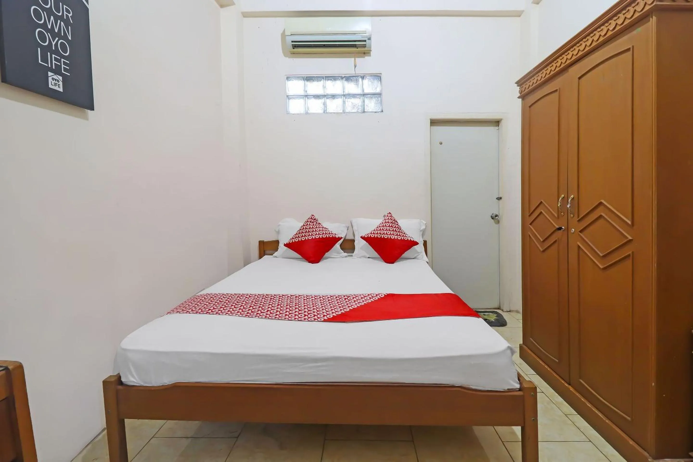 Bedroom in OYO 2899 Ardilia Bandara Syariah