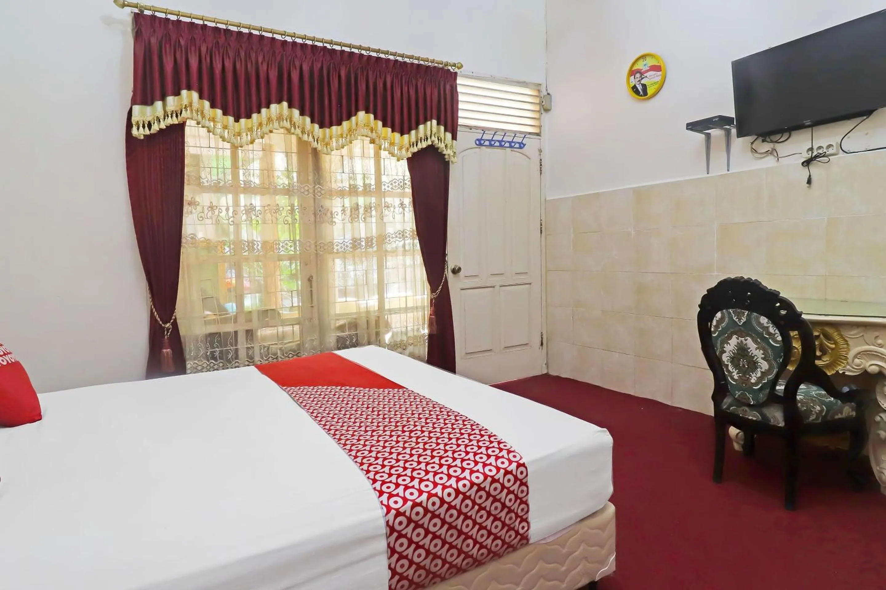 Bedroom in OYO 2899 Ardilia Bandara Syariah