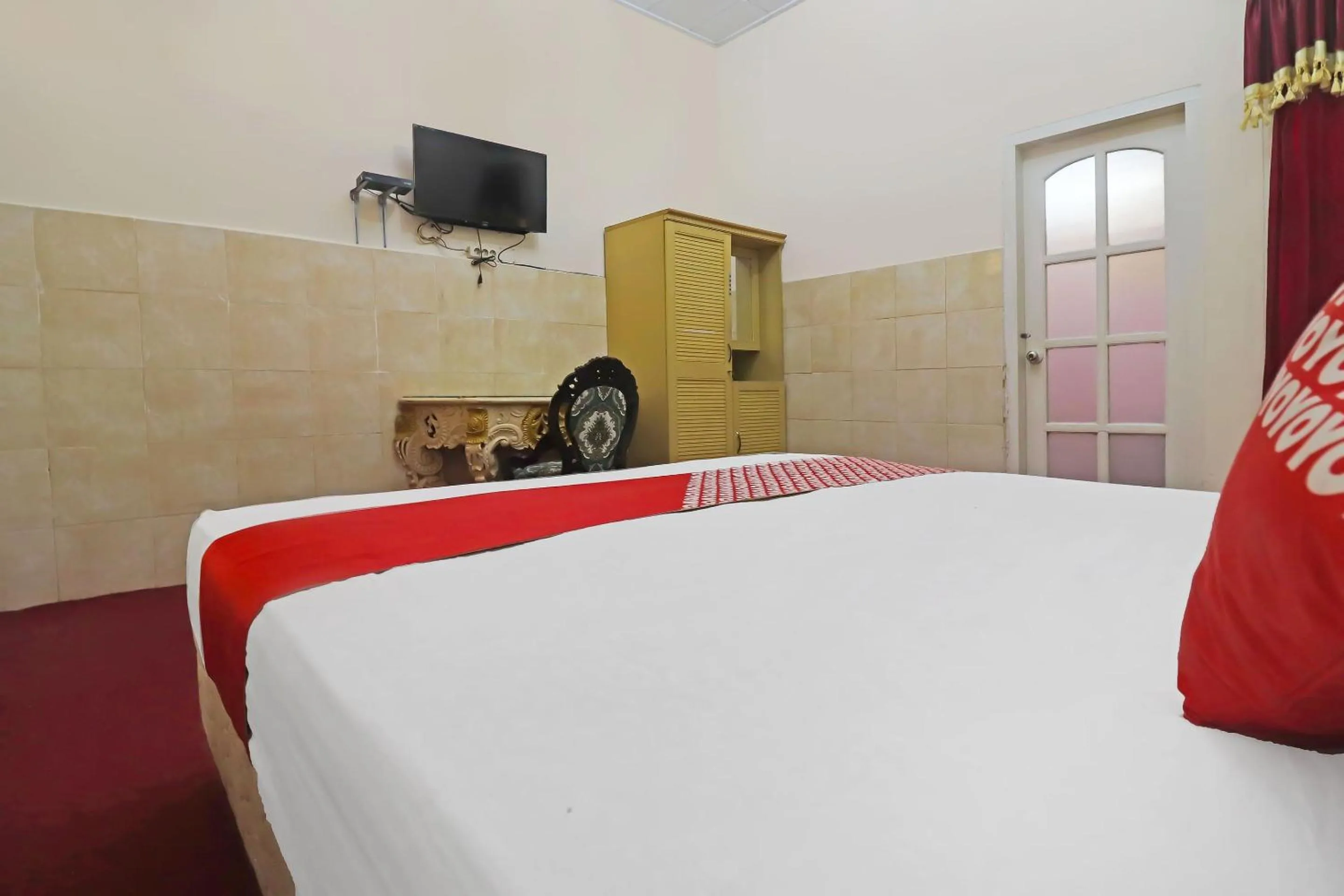 Bedroom in OYO 2899 Ardilia Bandara Syariah