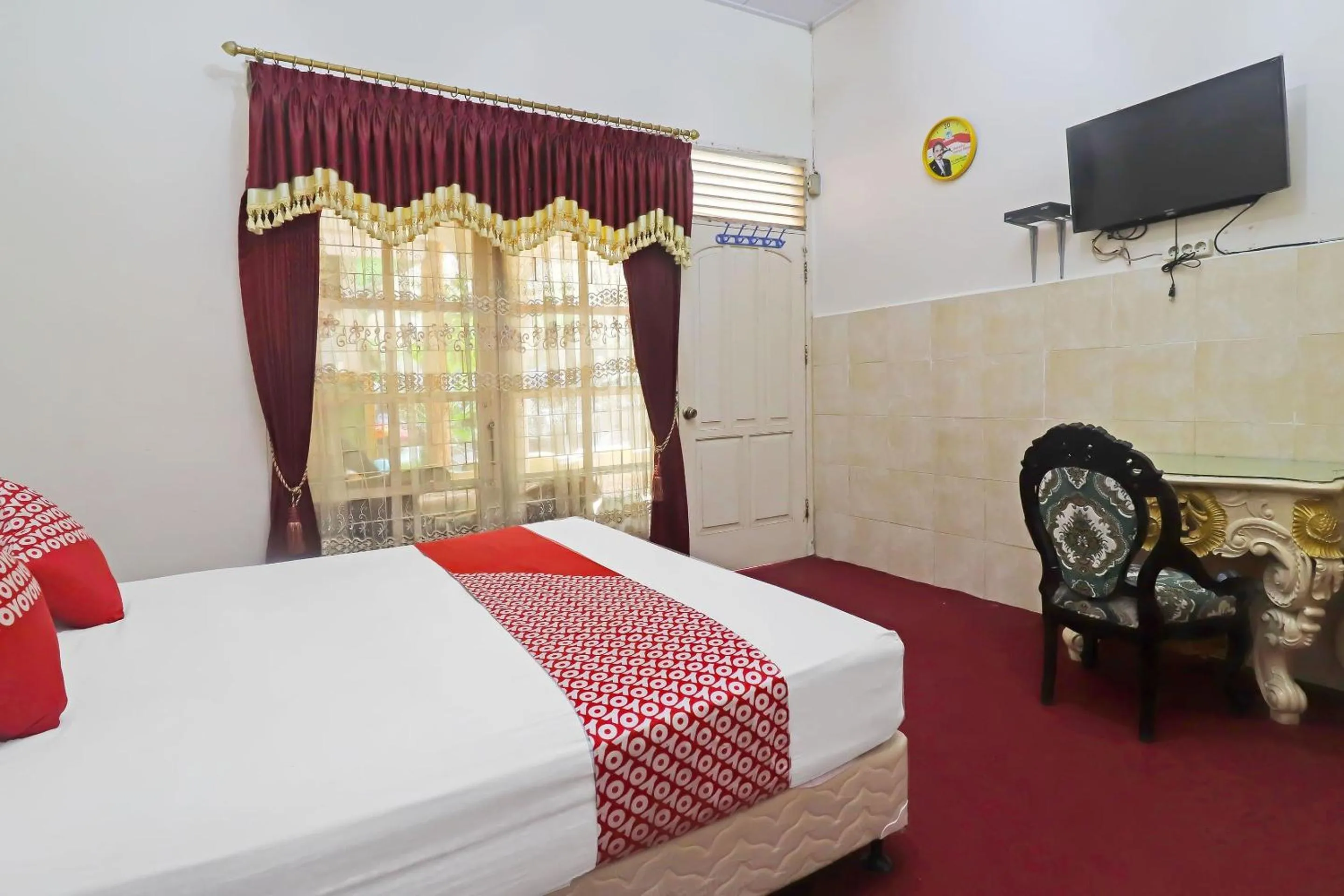 Bedroom in OYO 2899 Ardilia Bandara Syariah