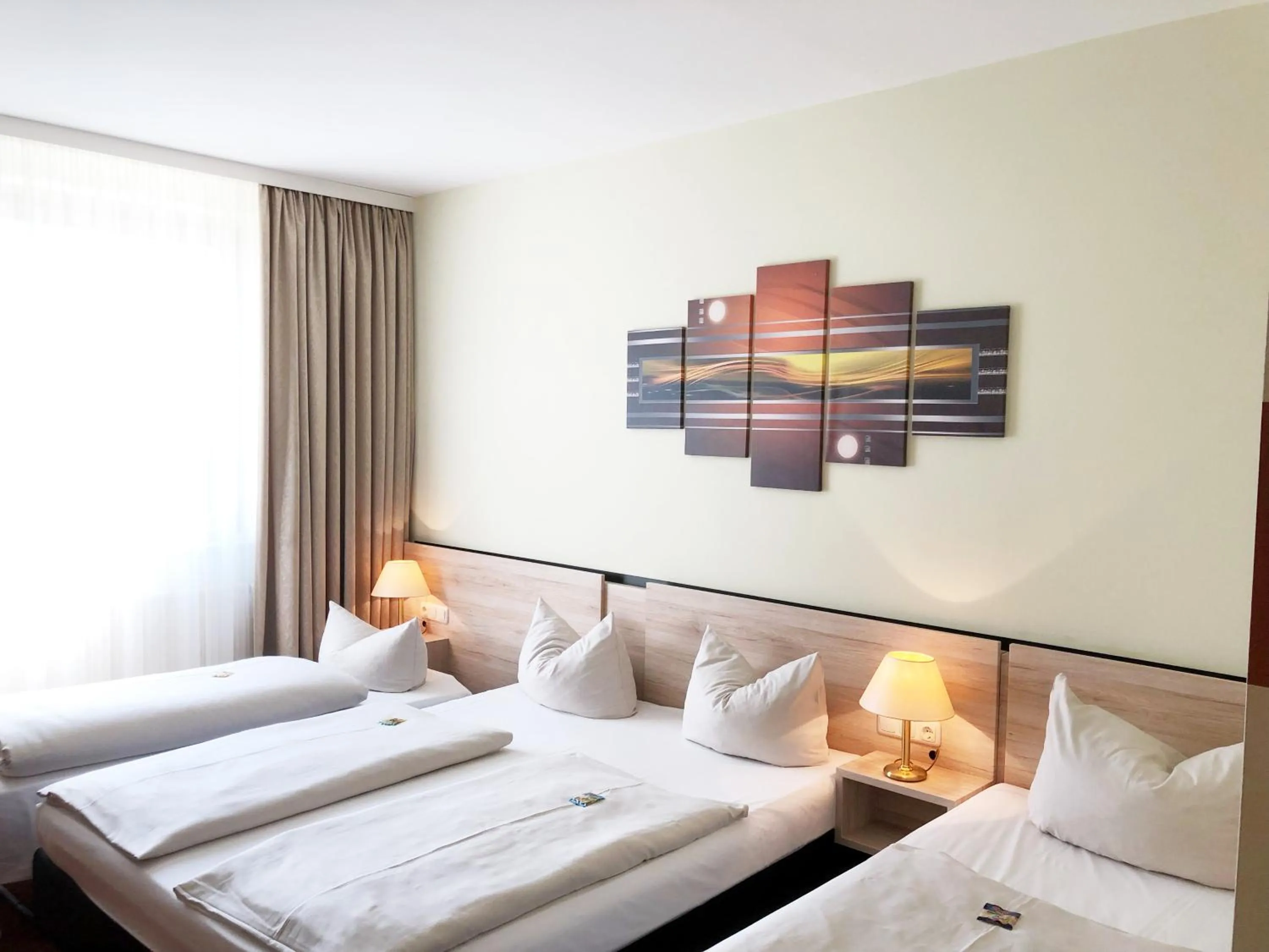 Bed in NOVINA HOTEL Südwestpark