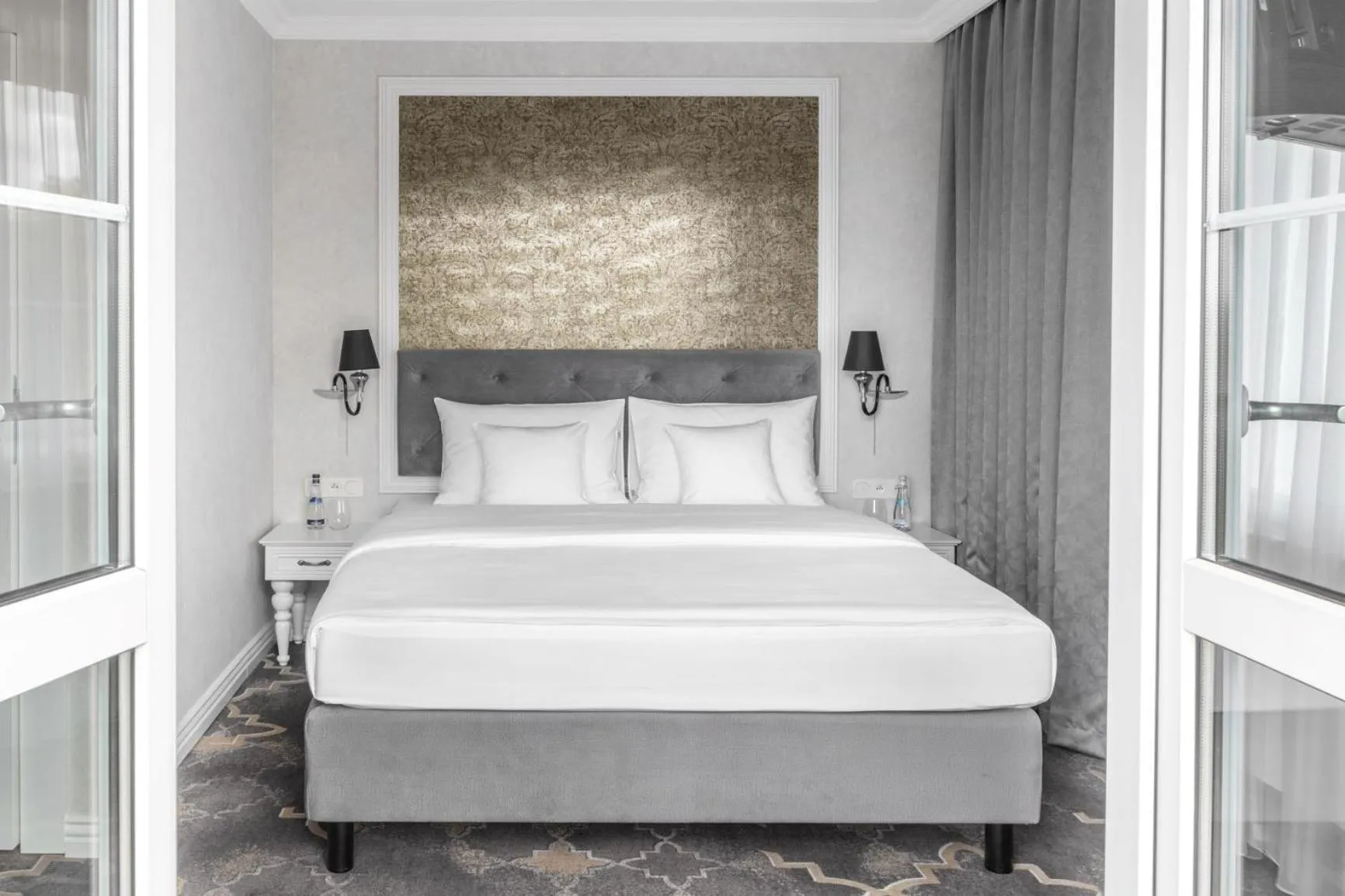 Bed in Merci Boutique Hotel