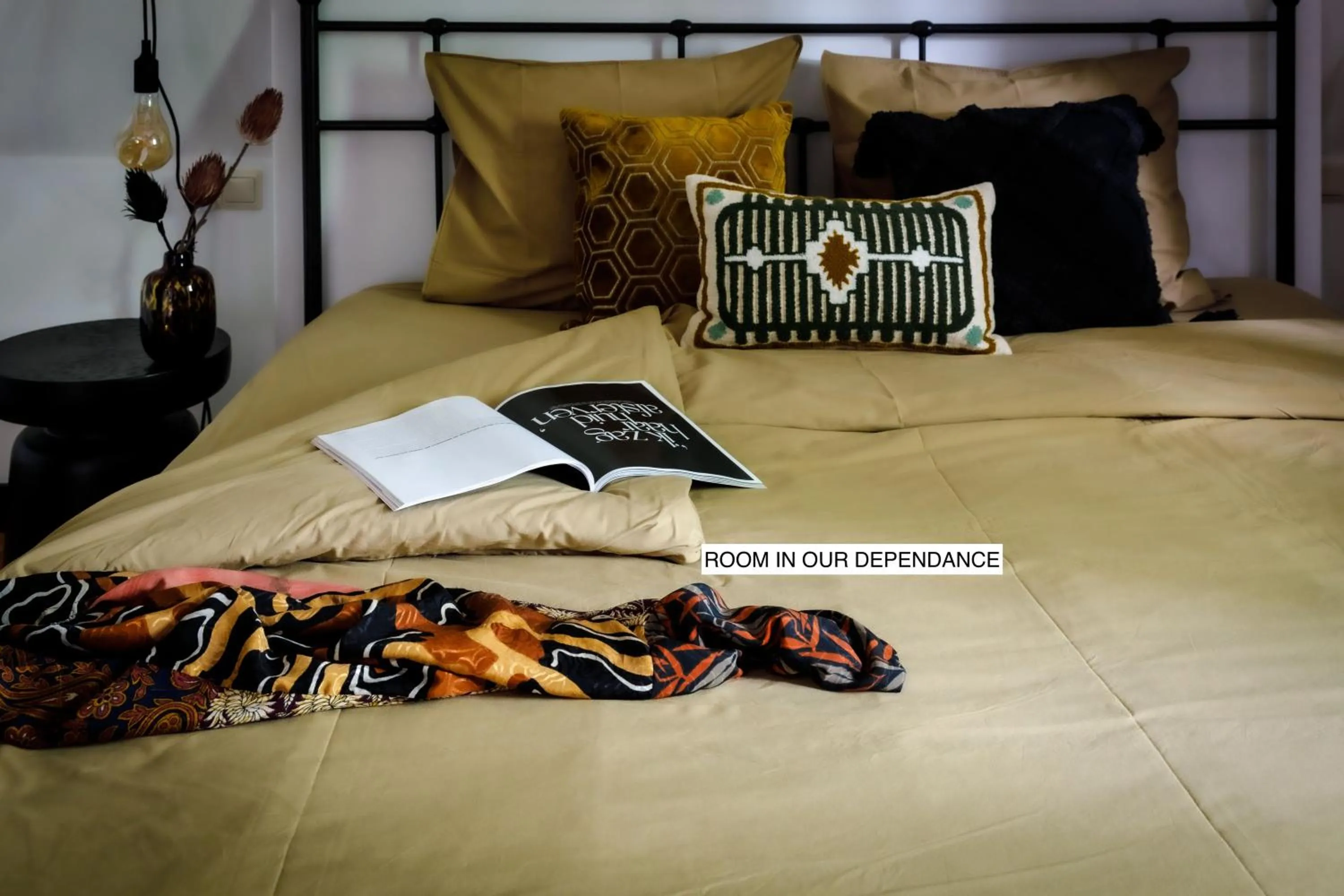 Bed in Stella Suites Boutique Hotel