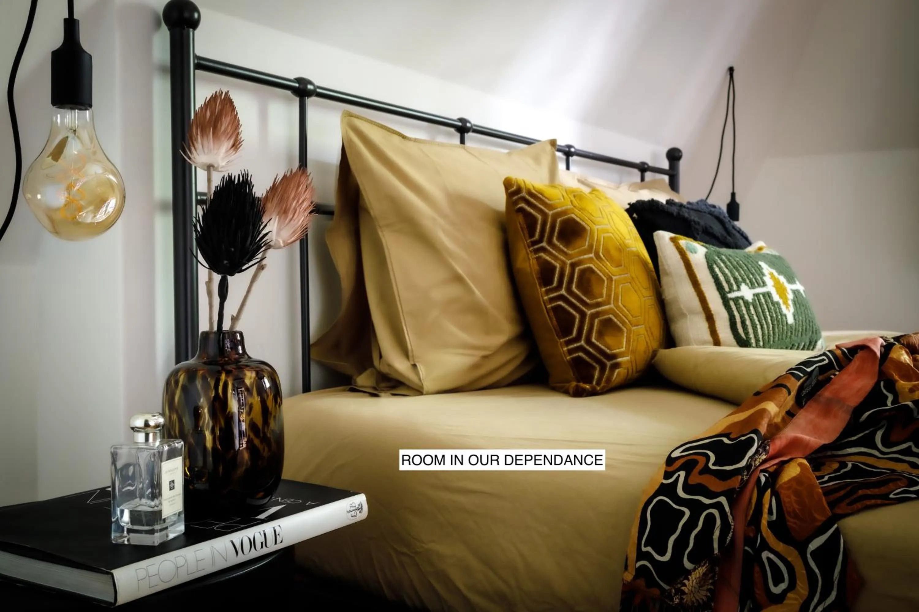 Bed in Stella Suites Boutique Hotel