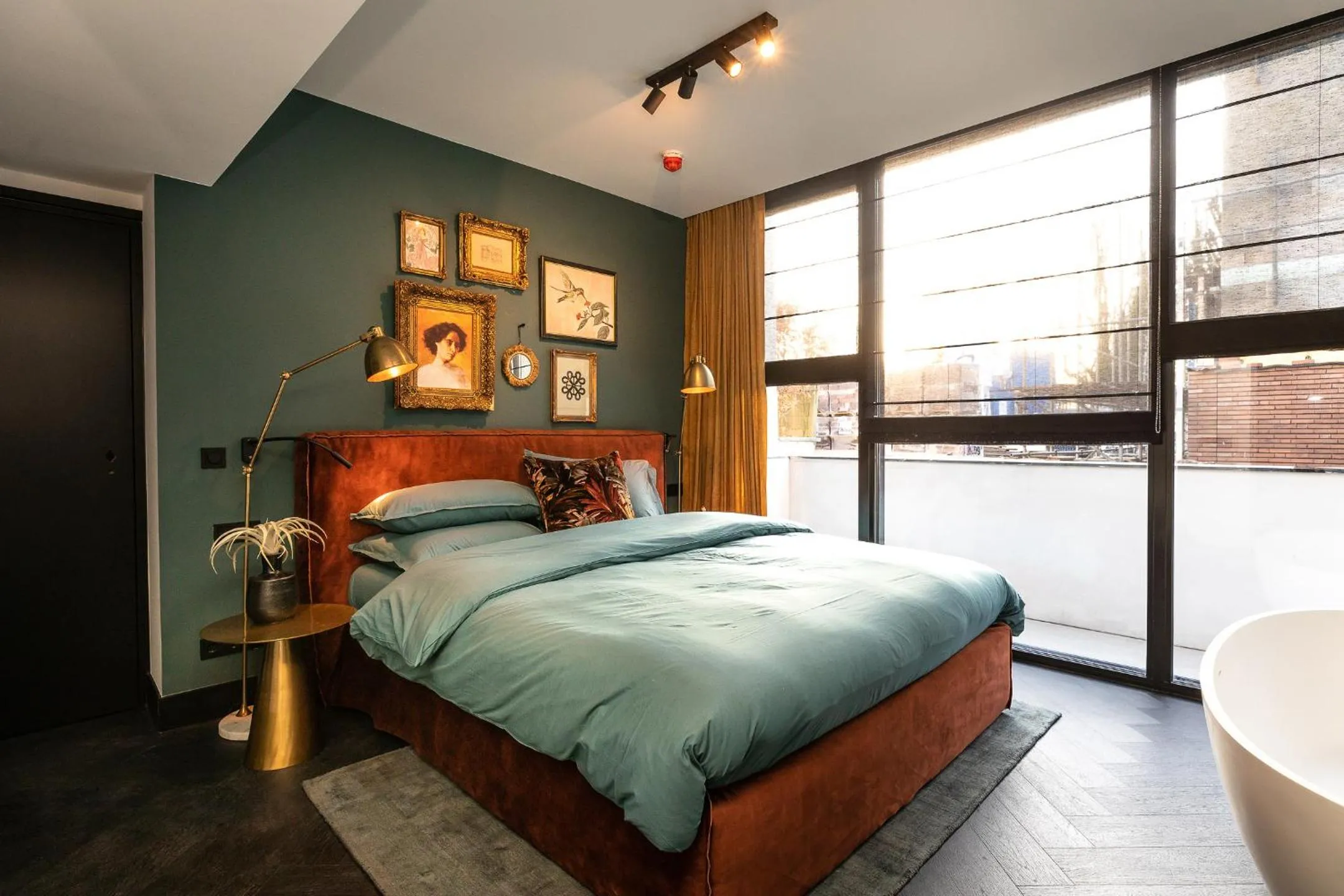 Bed in Stella Suites Boutique Hotel