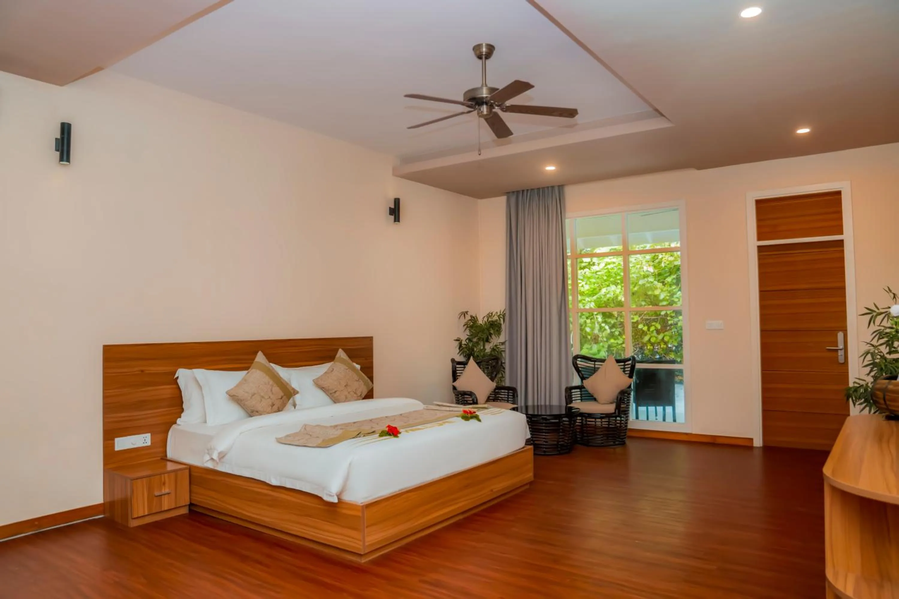 Bed in Brennia Kottefaru Maldives