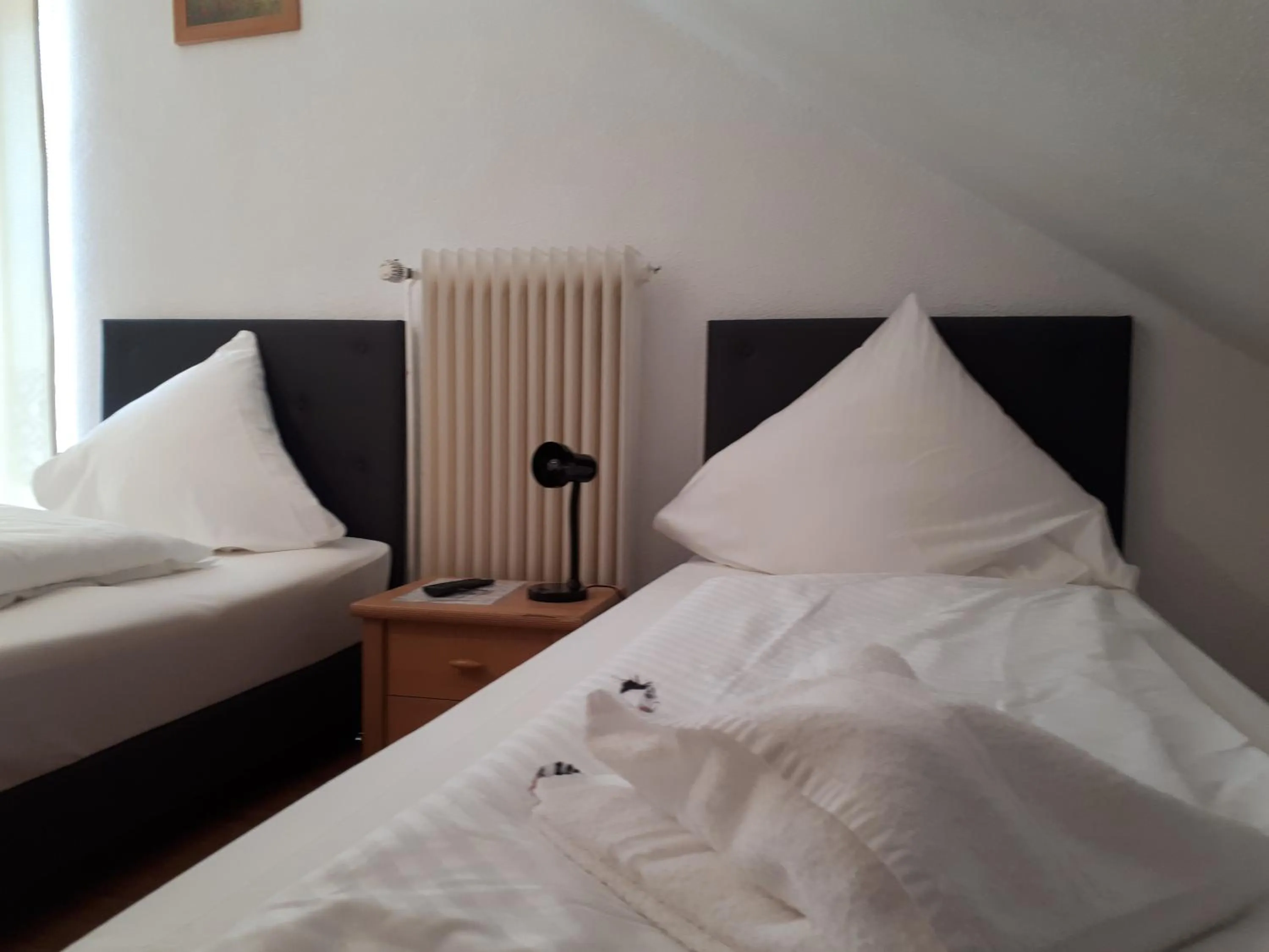 Bed in Hotel Taverne Inos