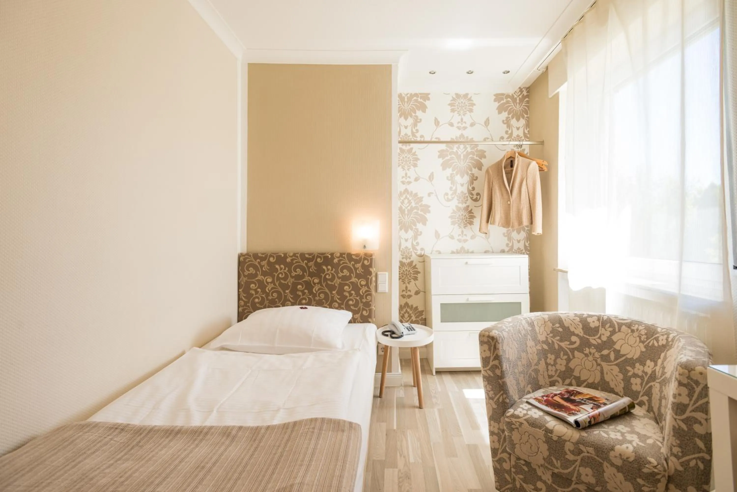 Seating area, Bed in Hotel Ahrbella