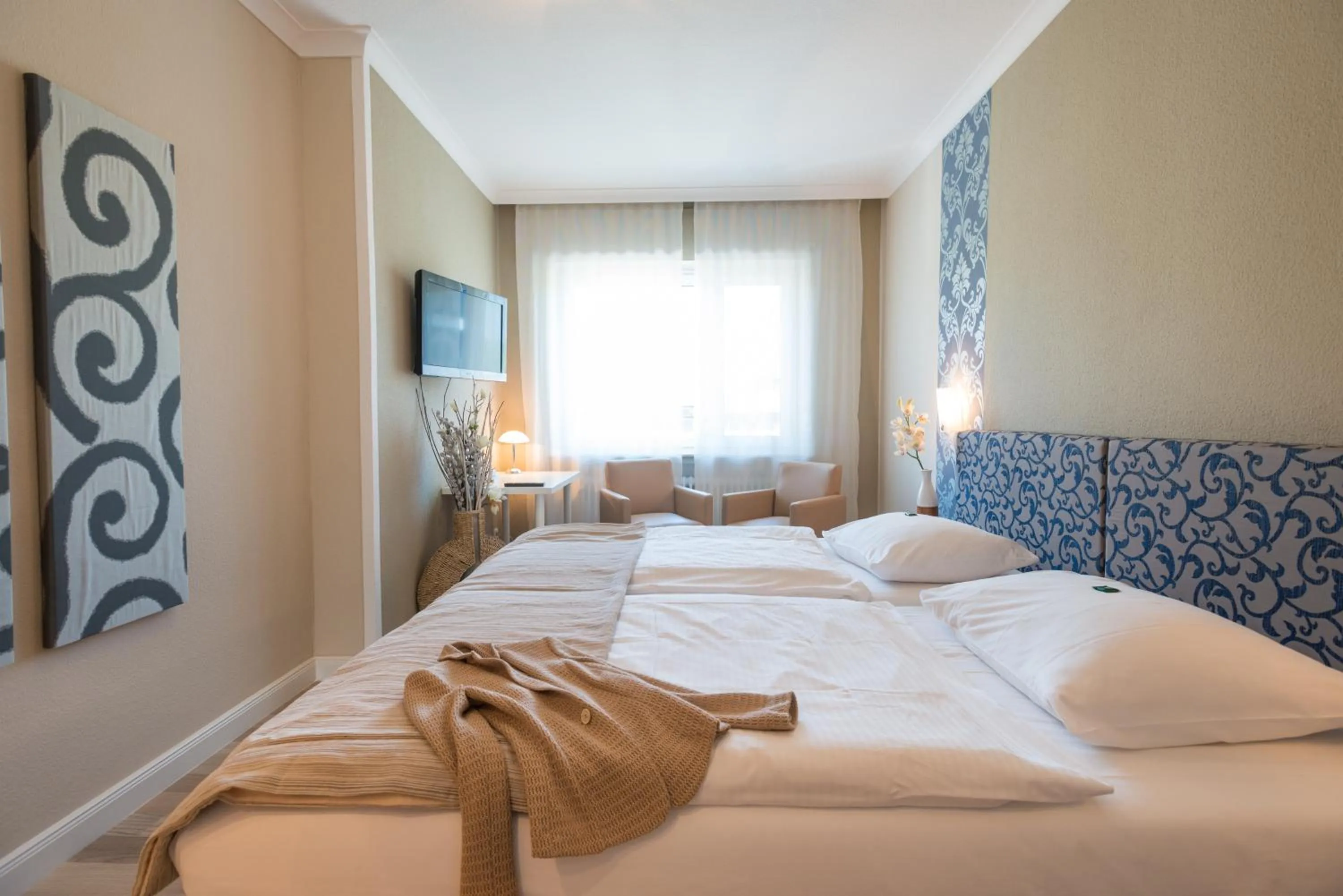 Seating area, Bed in Hotel Ahrbella