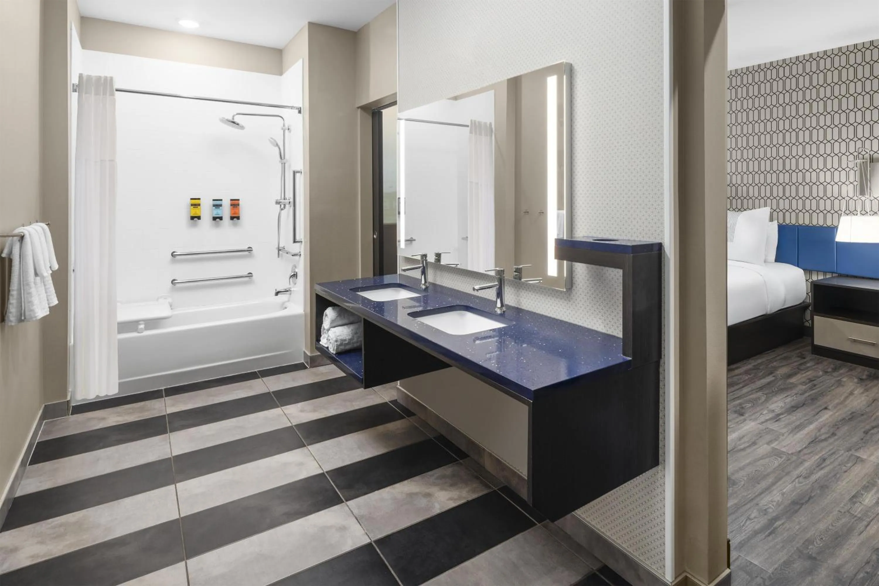 Bathroom, Bed in GLō Best Western Dawley Farms In Sioux Falls