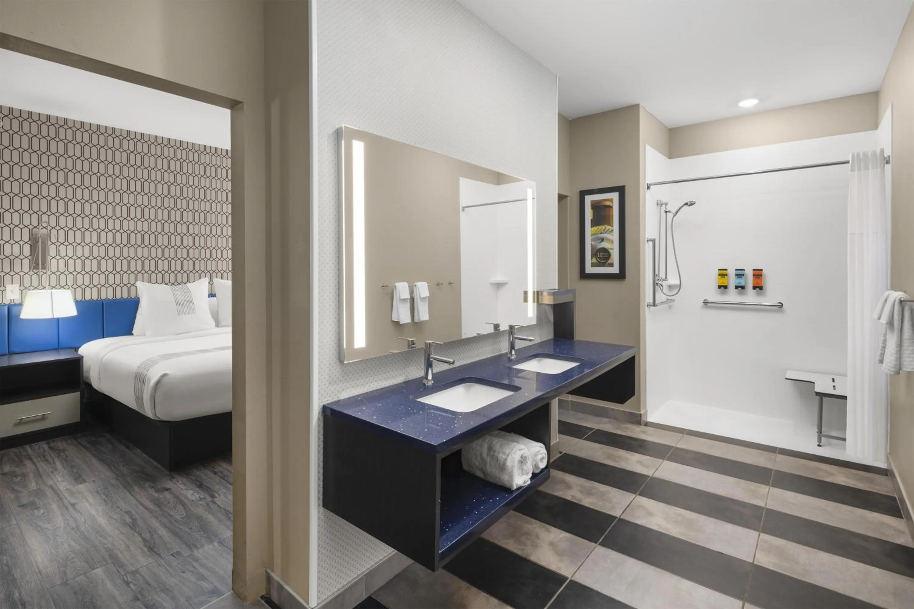 Bathroom, Bed in GLō Best Western Dawley Farms In Sioux Falls