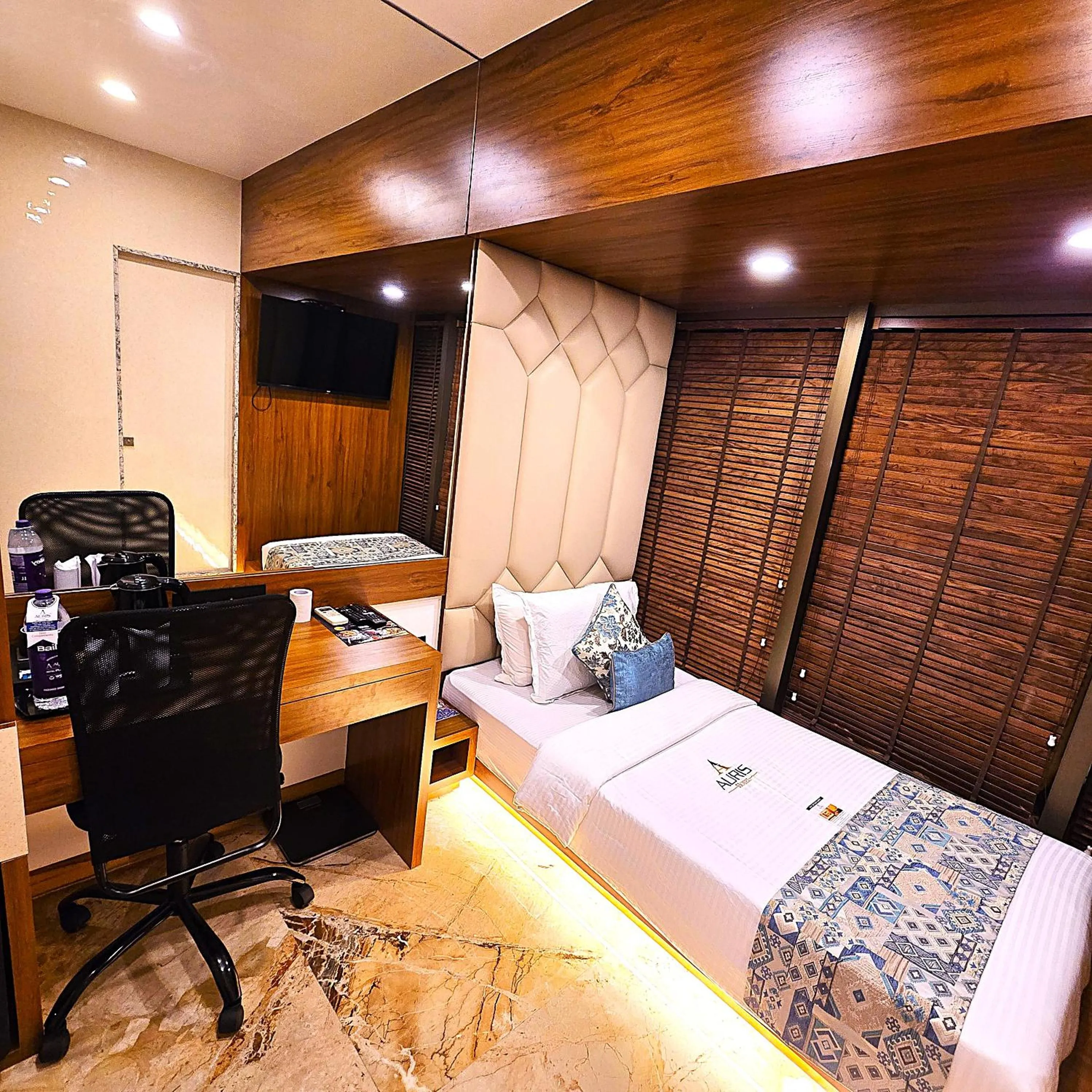 Bed in Hotel Auris & Banquets, Mumbai International Airport