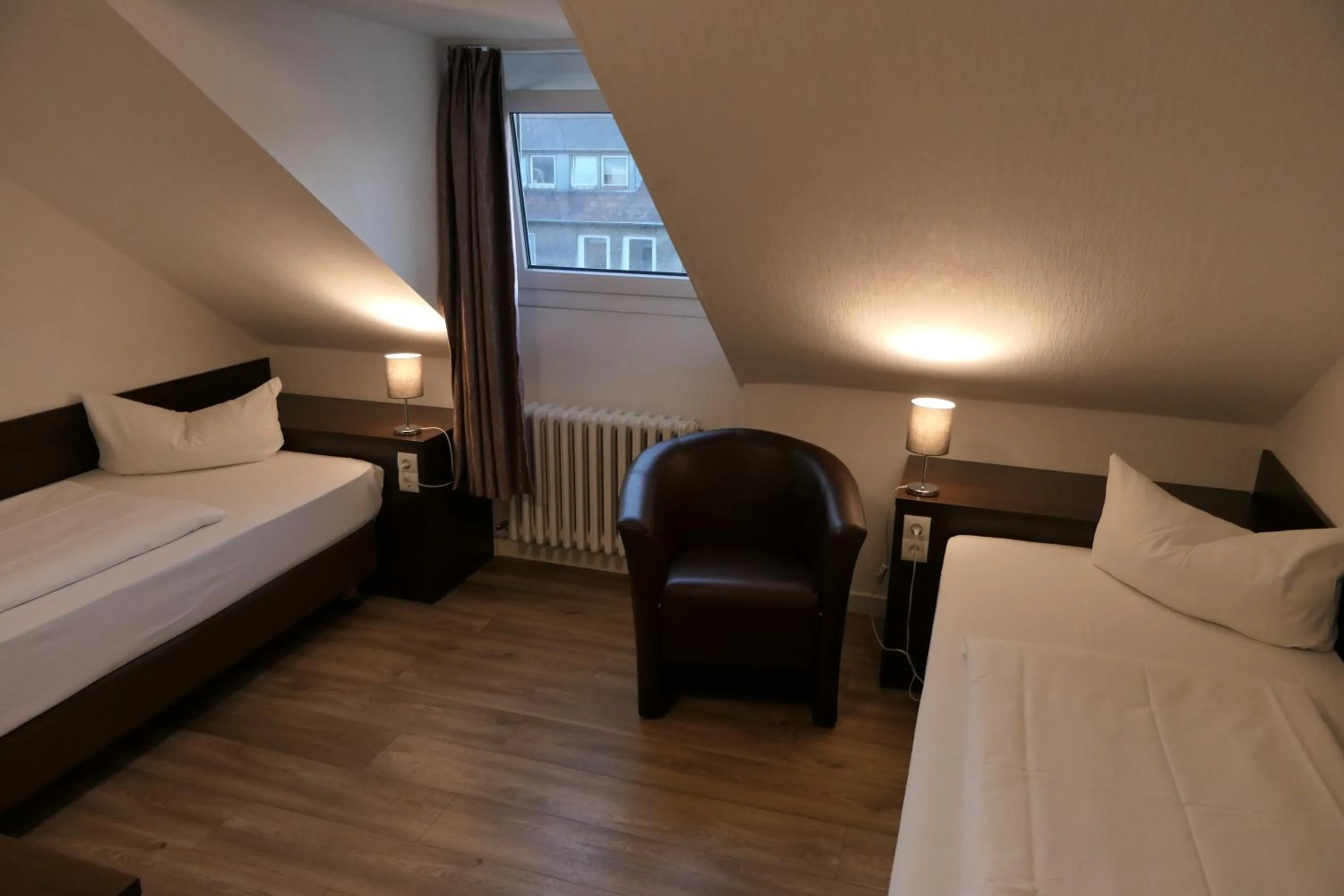 Photo of the whole room, Bed in Hotel Schumacher Düsseldorf