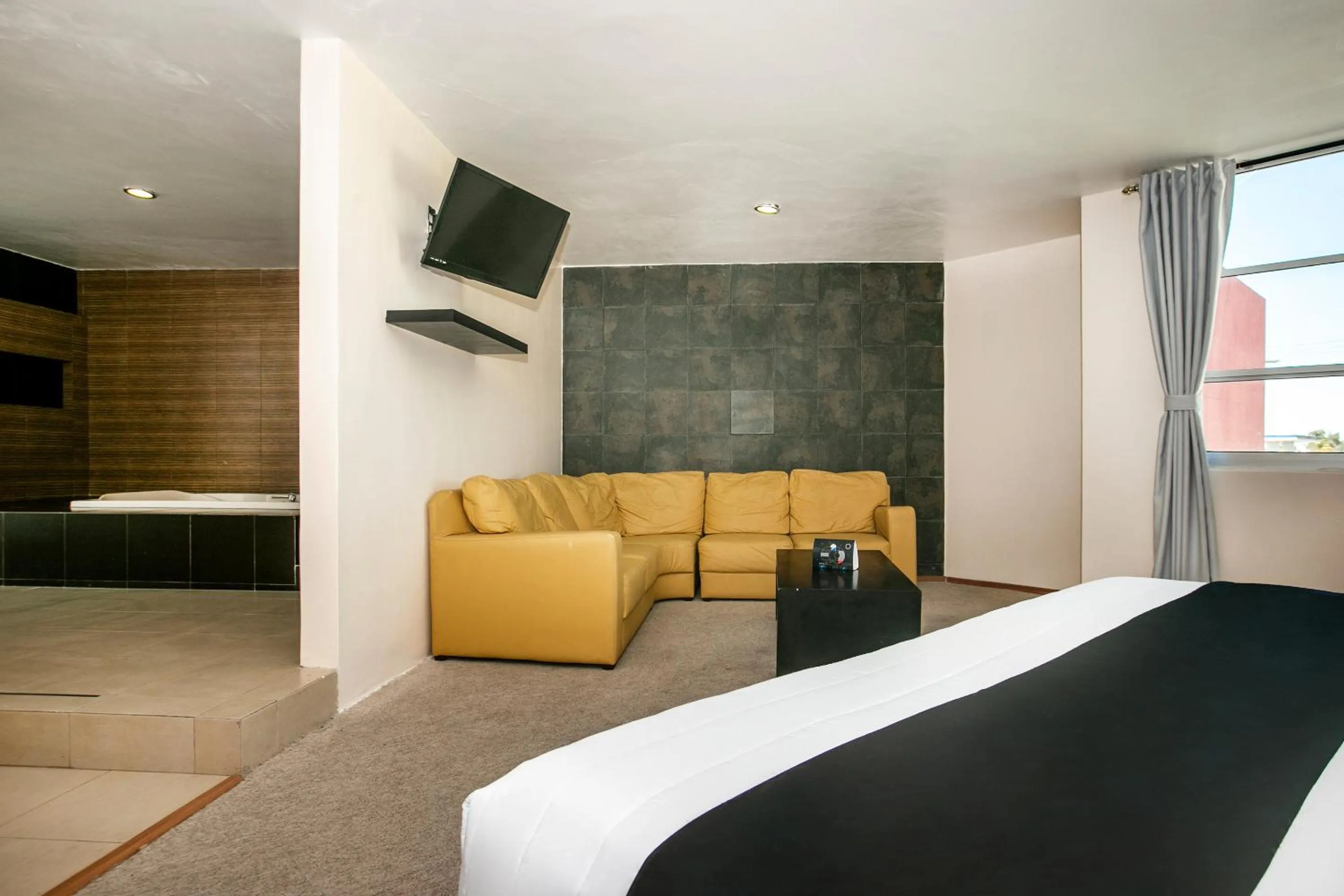 Seating area, Bed in Hotel Euro Confort,Pachuca