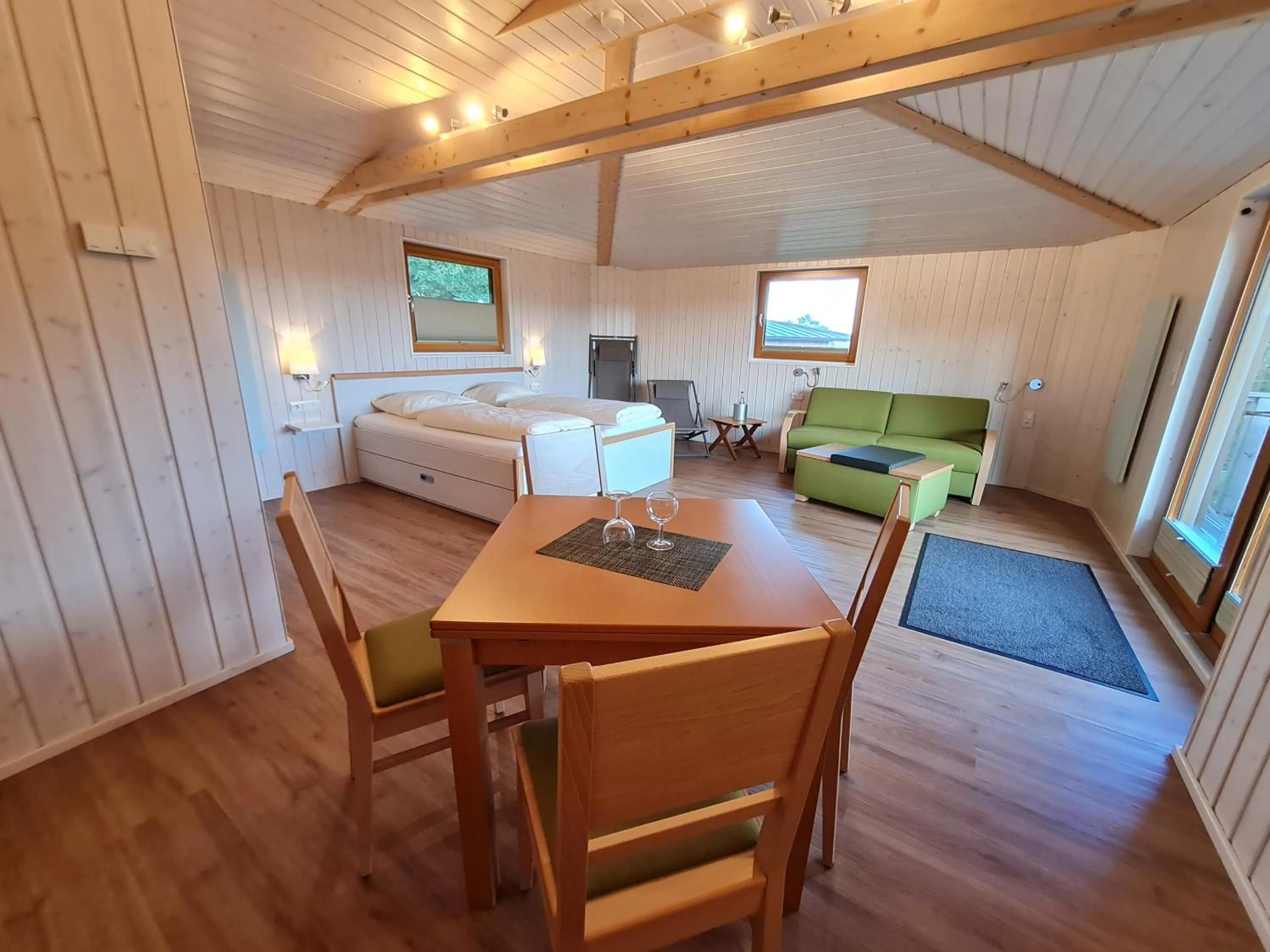 Bed in Hotel Waldquelle - Baumhaushotel Aerzen