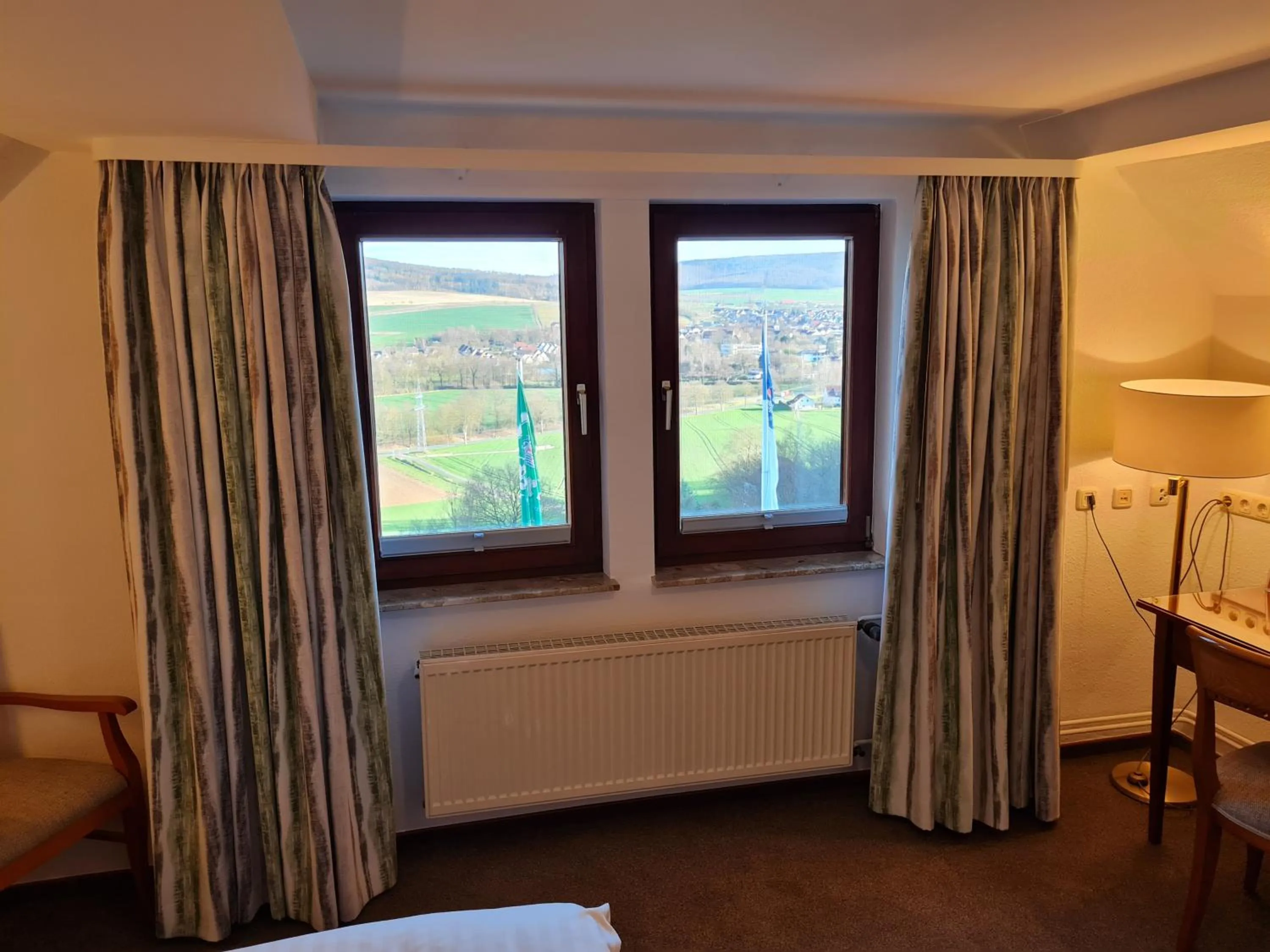View (from property/room), Bed in Hotel Waldquelle - Baumhaushotel Aerzen