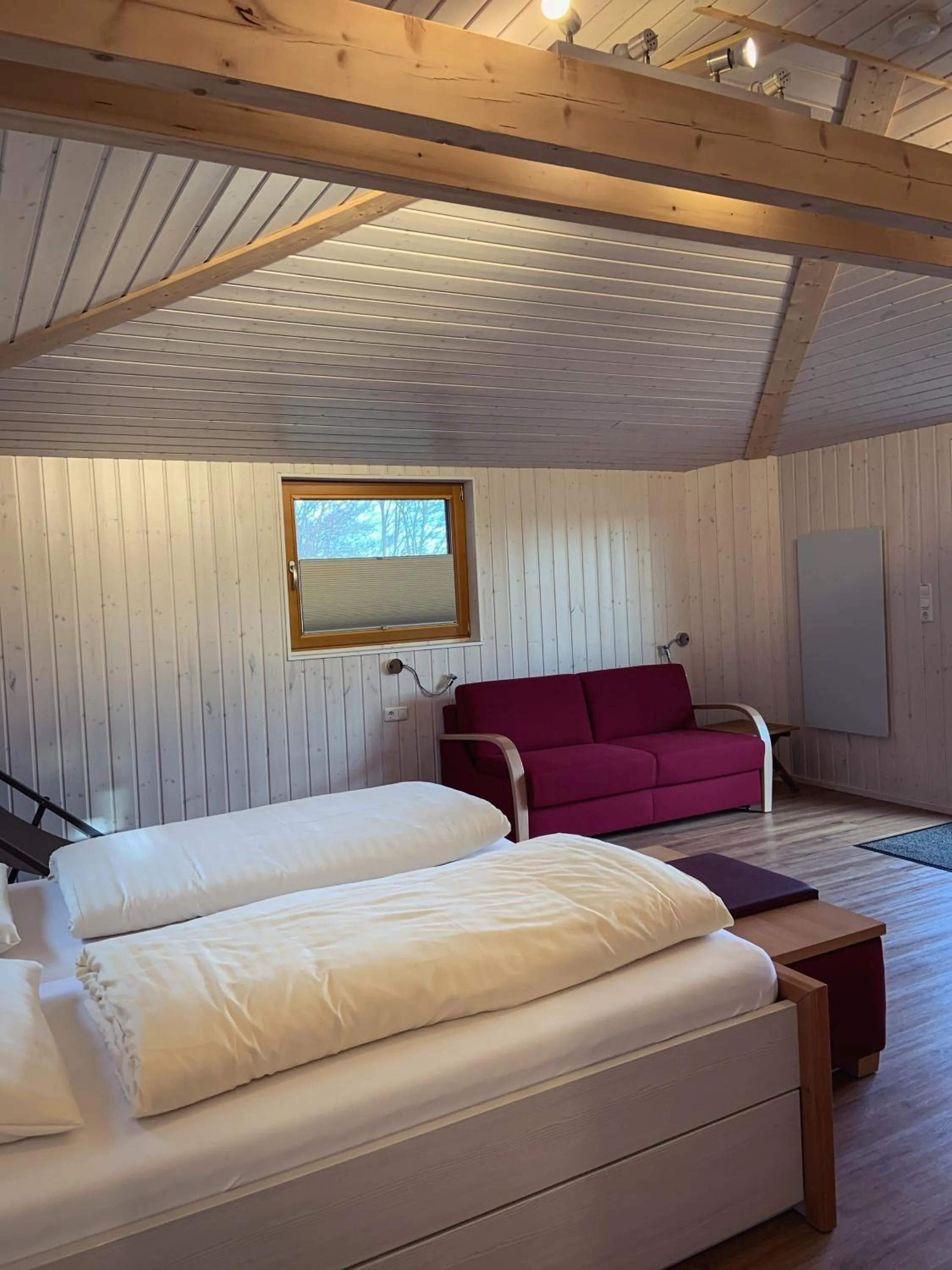 Bed in Hotel Waldquelle - Baumhaushotel Aerzen