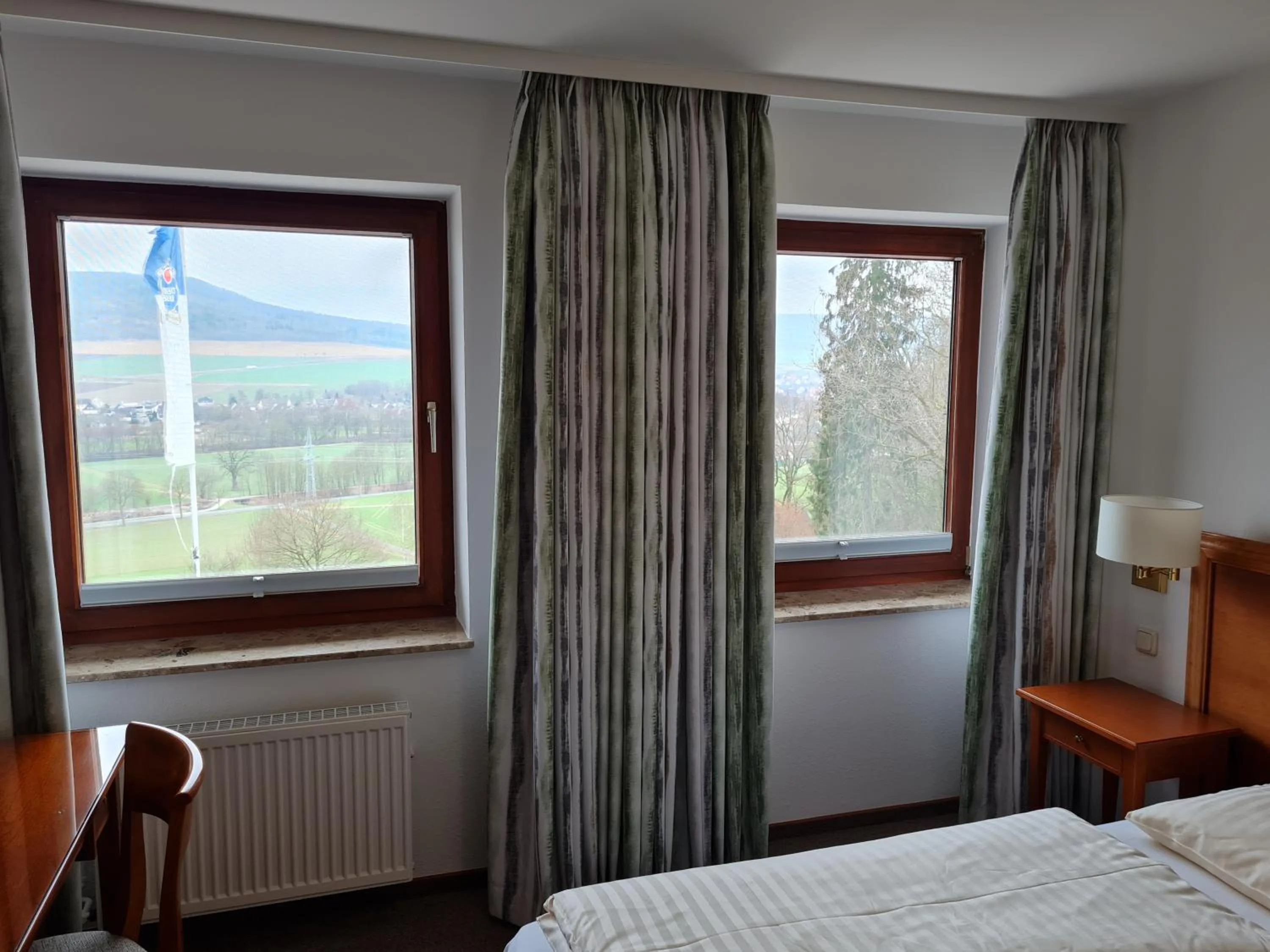 View (from property/room), Bed in Hotel Waldquelle - Baumhaushotel Aerzen