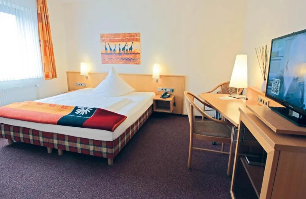 Photo of the whole room, Bed in Hotel Lindenkrug