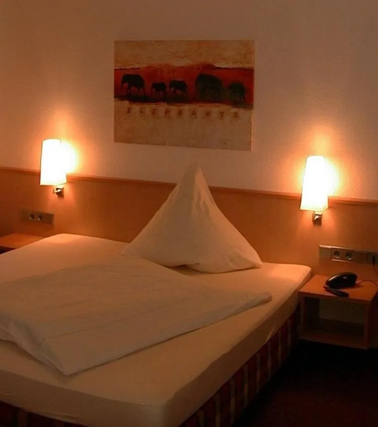 Photo of the whole room, Bed in Hotel Lindenkrug