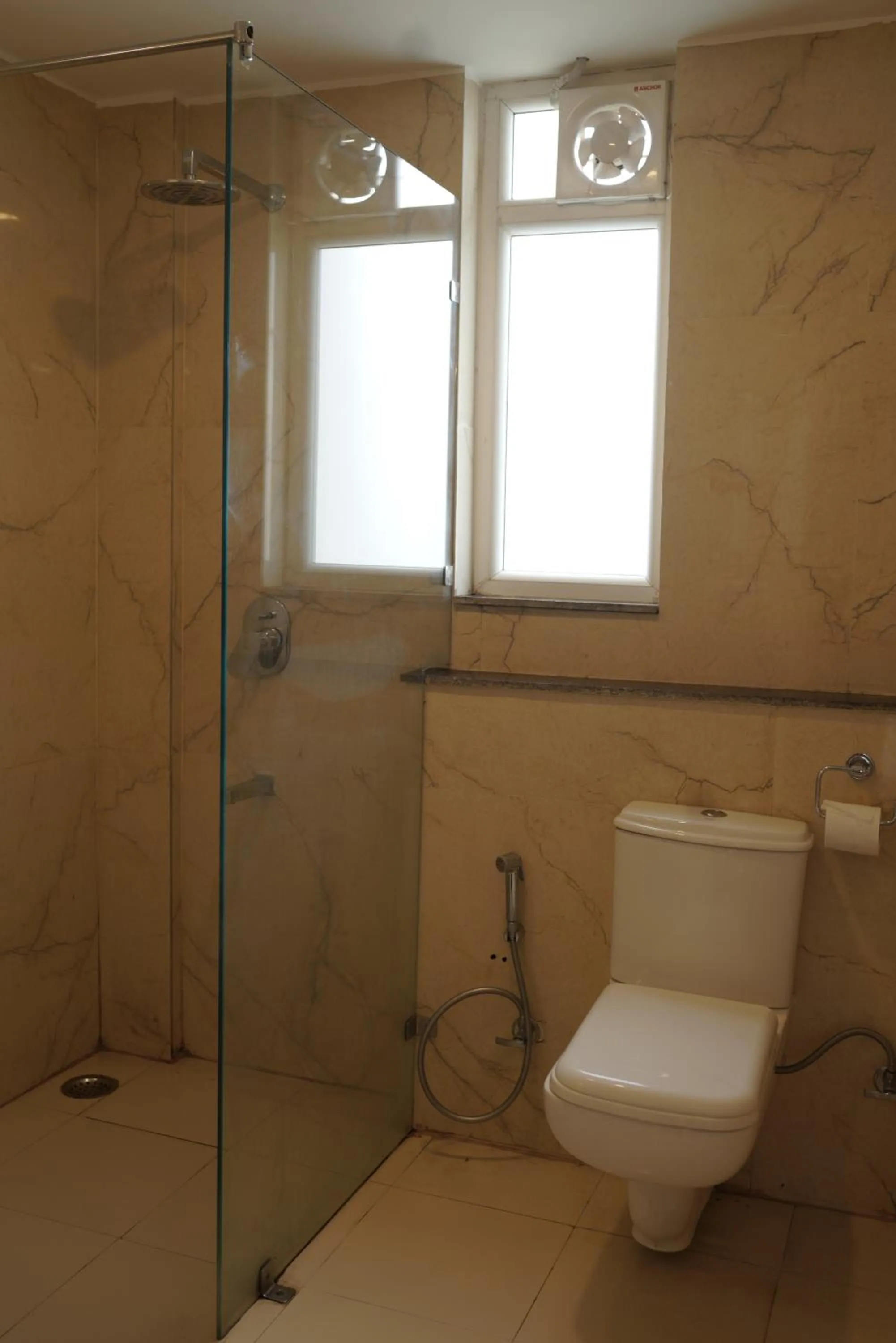 Bathroom in Hotel White Rock By The Solitaire Hospitality