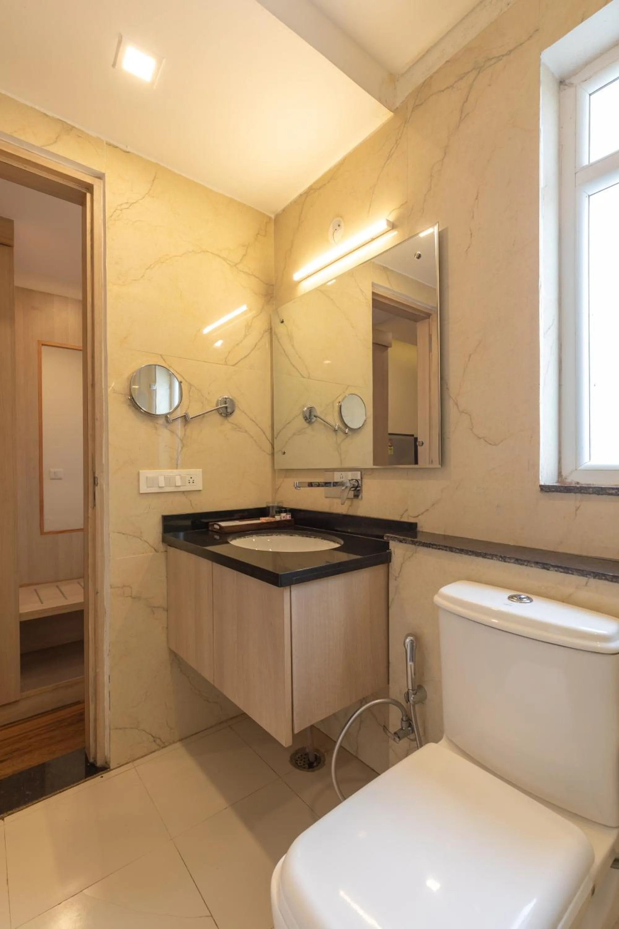 Bathroom in Hotel White Rock By The Solitaire Hospitality